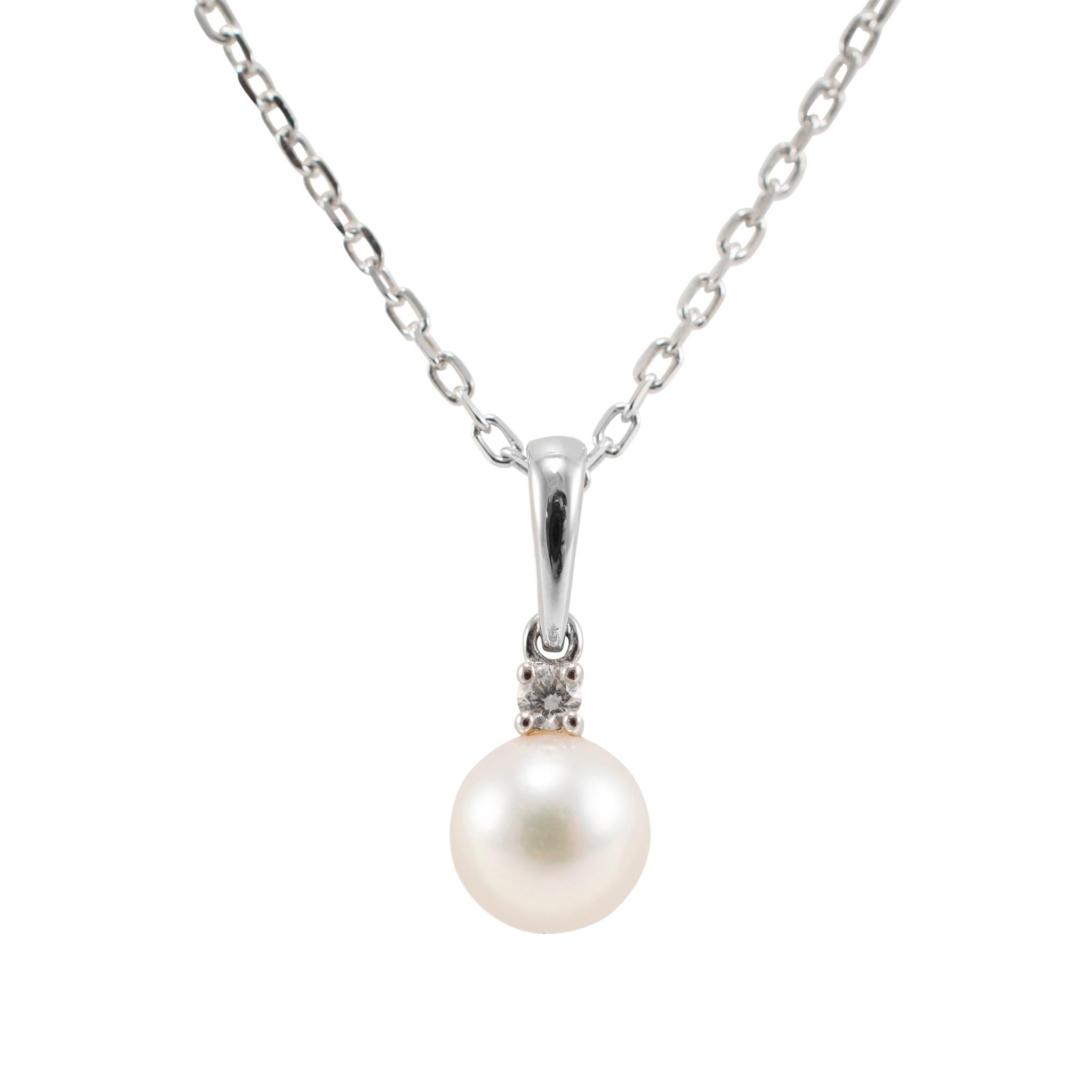 Brand: Mikimoto

Gender: Ladies

Metal Type: 18K White Gold

Length: 18.00 inches

Weight: 2.84 grams

Ladies designer made polished 18K white gold single strand diamond and pearl necklace. The metal was tested and determined to be 18K white gold.