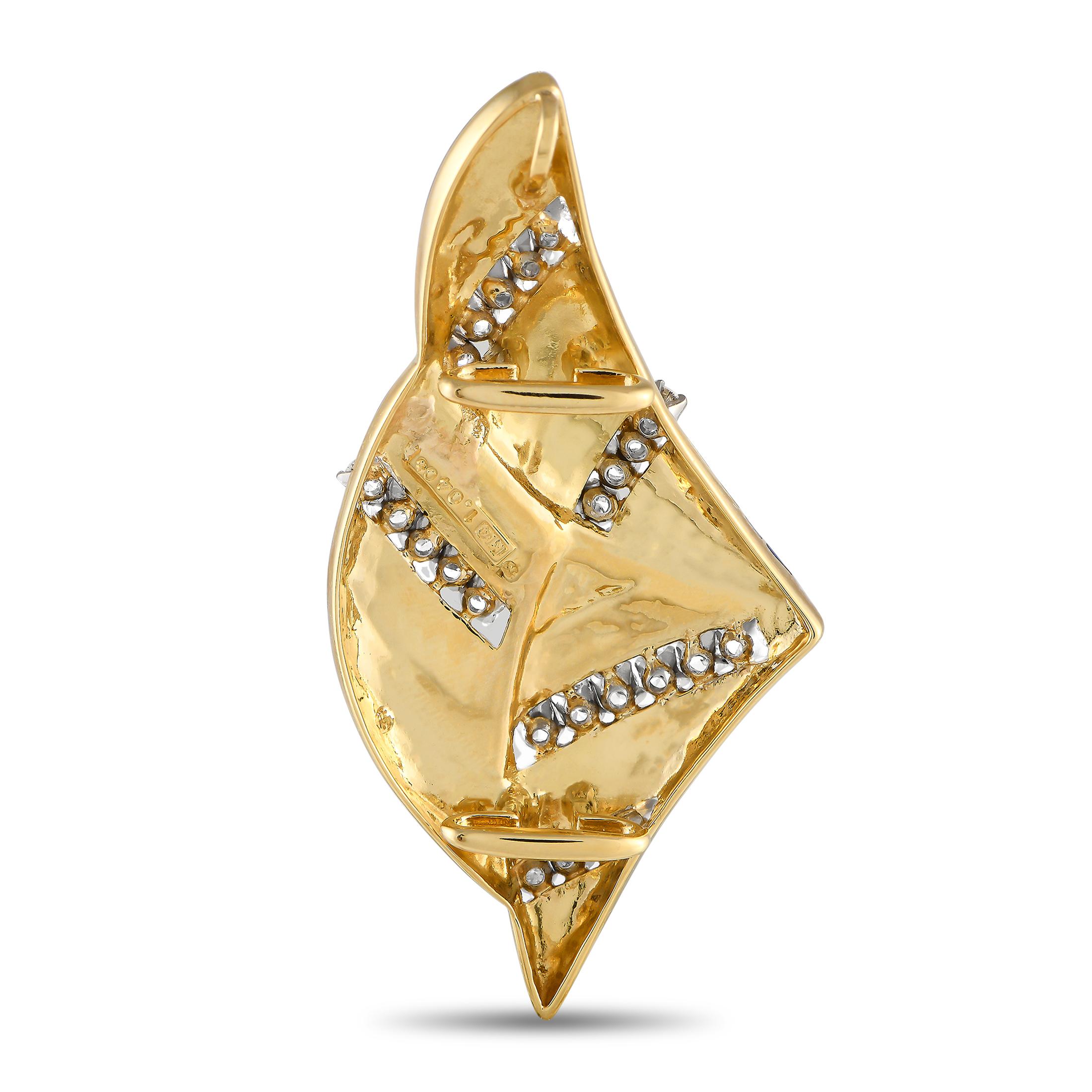 Crafted in 18K yellow gold, here is a rare Mikimoto Art Deco-inspired pendant with diamond accents ready to put a fashionable spin into your looks. The pendant features wide strips of blue enamel traced with yellow gold and ribbons of round