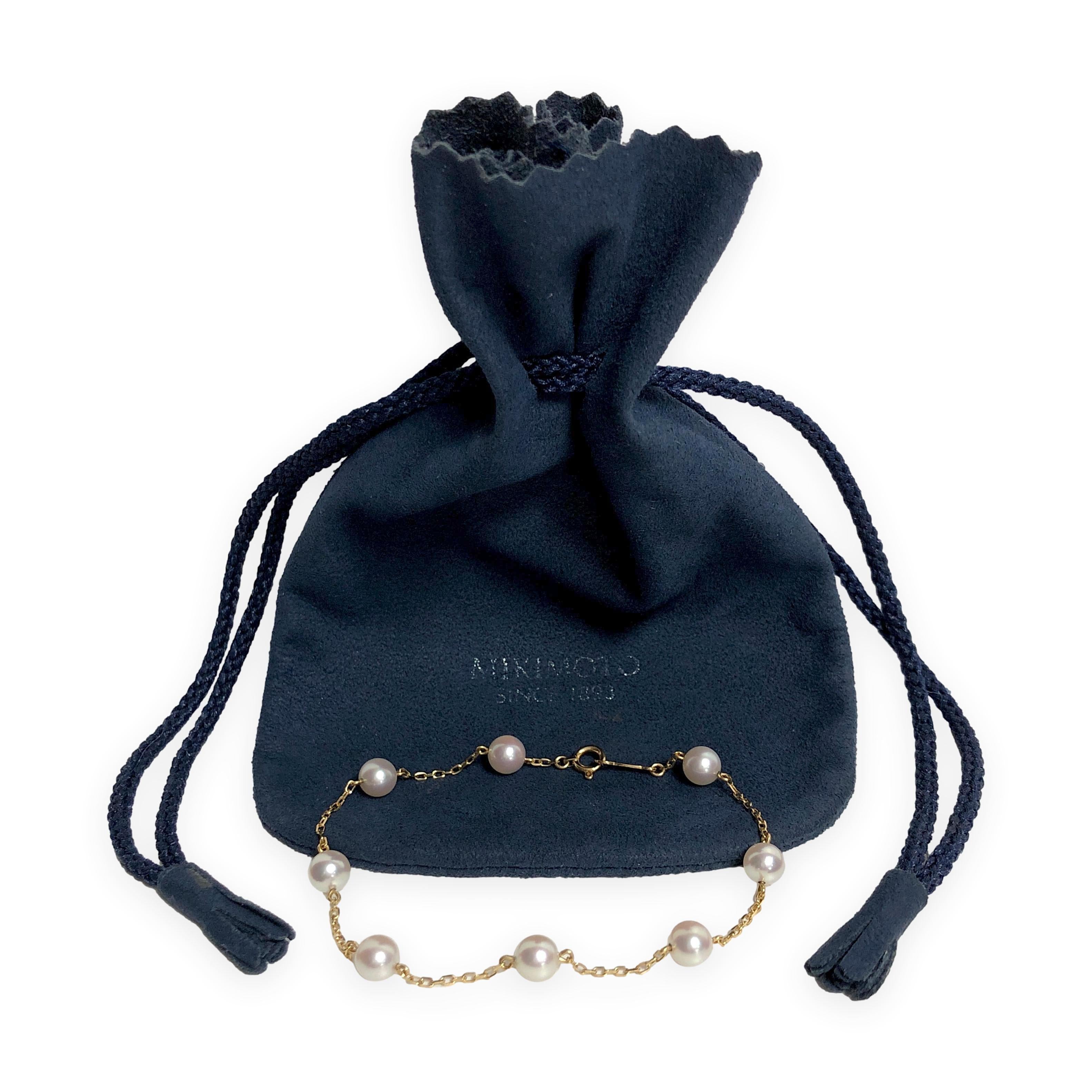Mikimoto oro giallo 18 carati  Bracciale a stazione con perle da 5,5 mm - 7