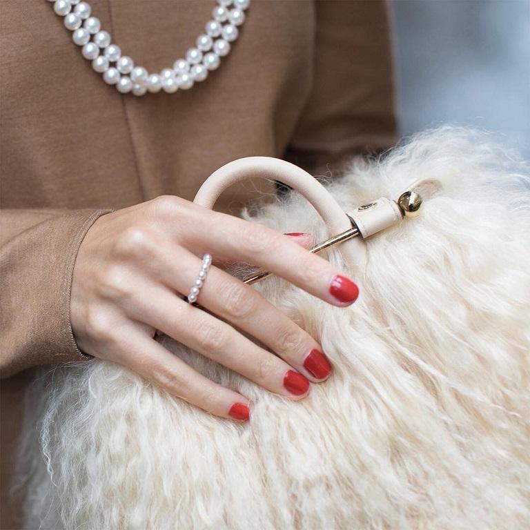 A stackable ring that adds elegance to everyday wear. This ring features 3.5 Akoya cultured pearls set in 18K yellow gold.

This 18K yellow gold ring features seven beautiful Mikimoto Akoya A+ pearls along the top which measure 3.5mm each. Whether