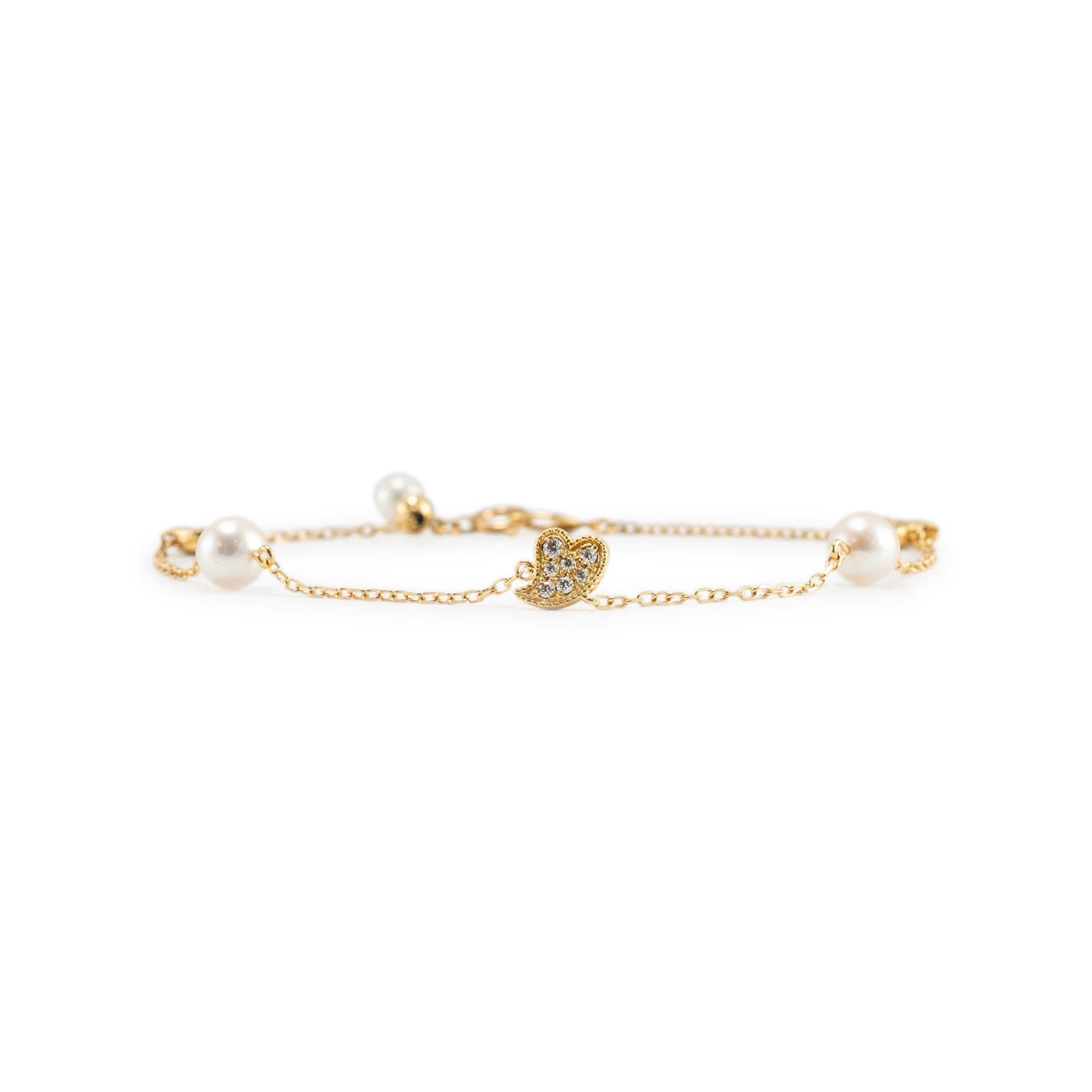 Marca: Mikimoto 

Sexo: Señoras

Tipo de metal: Oro amarillo de 18 quilates

Longitud: 7,75 pulgadas

Anchura: 4,53 mm

Peso: 107,66 gramos

Señoras MIKIMOTO  Pulsera de eslabones de oro amarillo de 18 quilates, diamantes y perlas. Grabado con