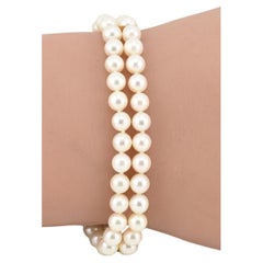 Mikimoto Pulsera de perlas de oro amarillo de 18 quilates 7" de longitud Perlas de 5,5 mm Marcada 750