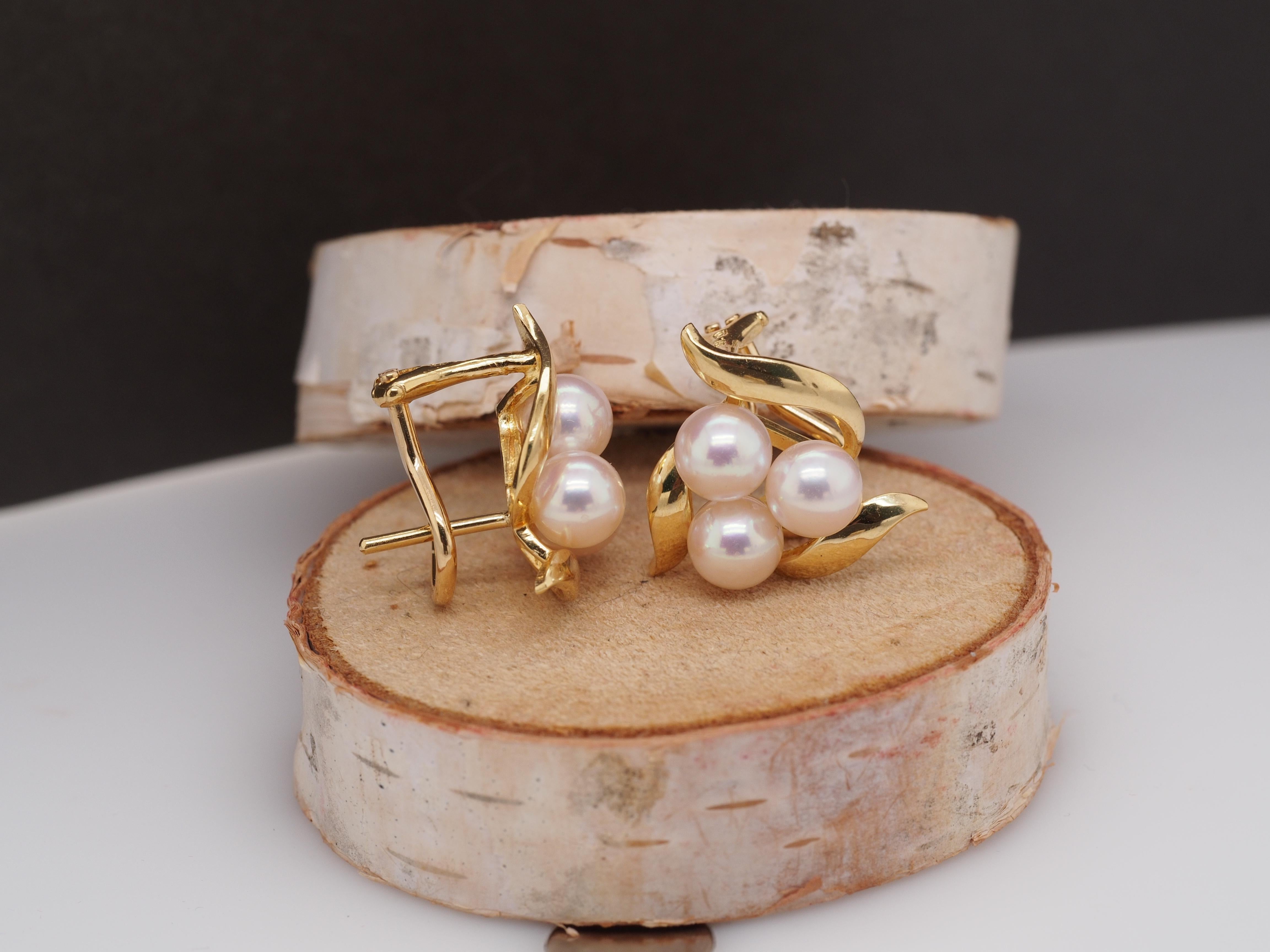 Year: 1990s

Item Details: Mikimoto
Metal Type: 18K Yellow Gold [Hallmarked, and Tested]
Weight: 7.1 grams

Pearl Details:

5mm, 6 stones total, pinkish luster, AAA Quality

Measurements:
Condition: Excellent

Price: $1500