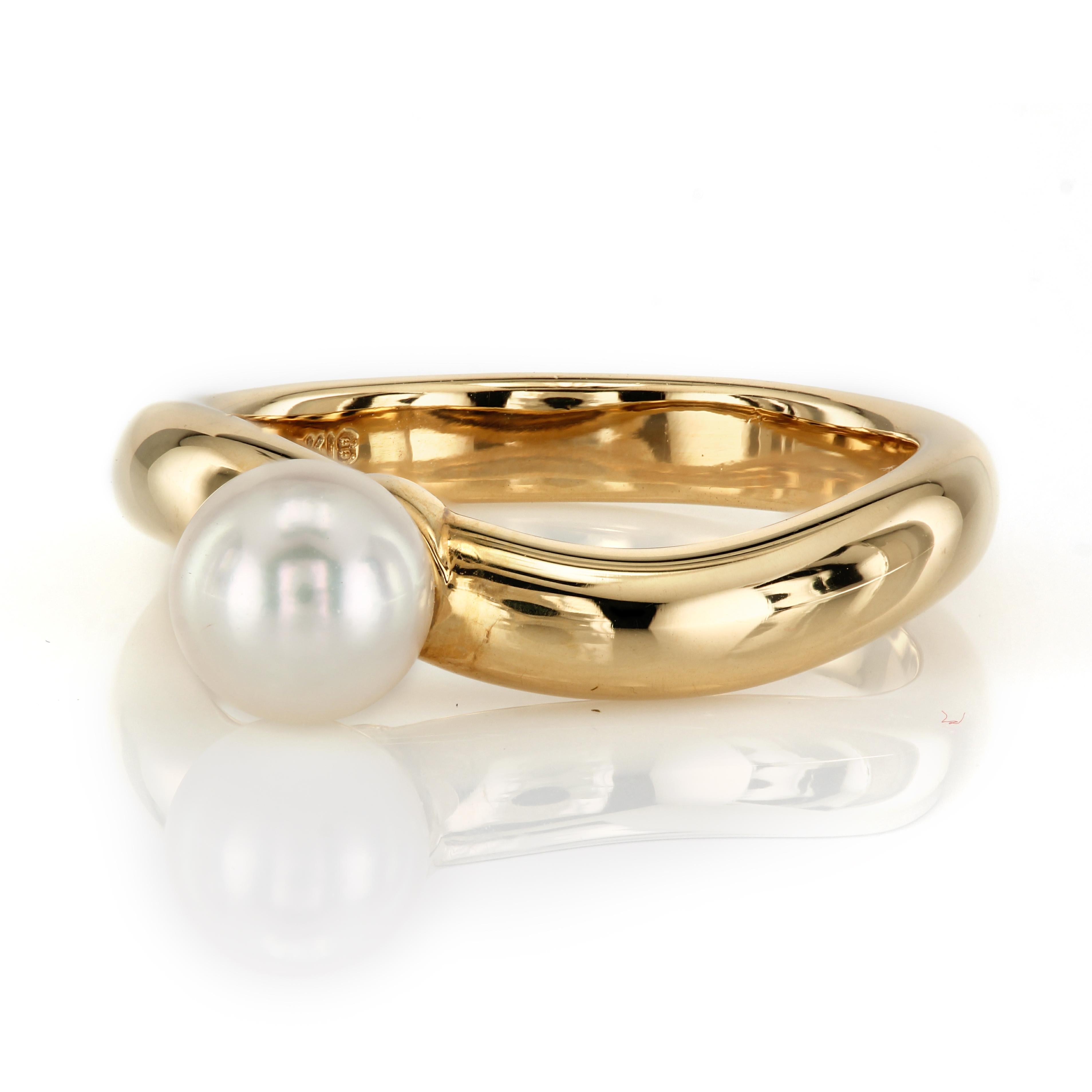 18K Yellow Gold Ring with Pearl
Rounded shank is 3. 7 mm on top 3.3 mm on the bottom 
Size: 6 1/2
Hallmarks: MI; 18K 