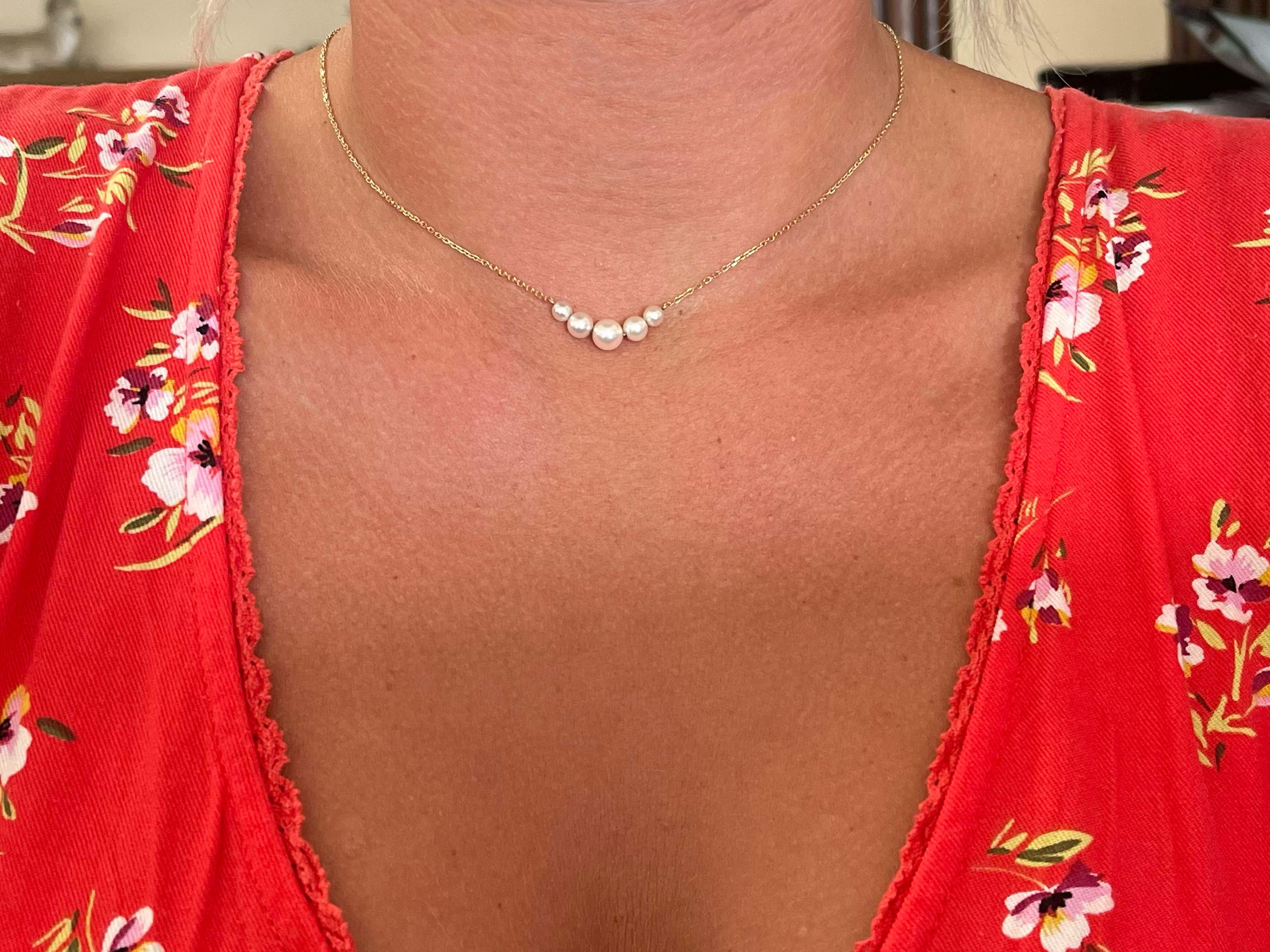This classic pearl necklace makes any outfit look outstanding. Set with 5 grade A Akoya pearls, this is a simple piece that pairs well with any occasion. The piece comes on a 14
