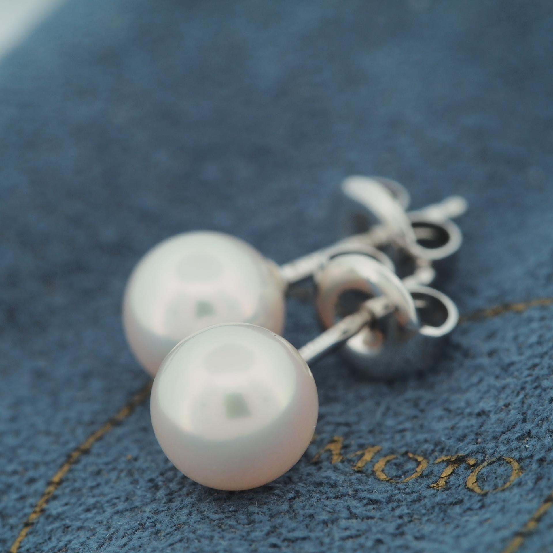 Item: Authentic Mikimoto Akoya Pearl Post Earrings
Stones: 7.0 mm, 7.0 mm Akoya Pearl
Metal: 18K White Gold
Weight: 1.9 Grams (total)
Condition: Used
Retail Price: ---
Signatures: MIKIMOTO, K18
Accessories: only Pouch ( in used condition)

These are