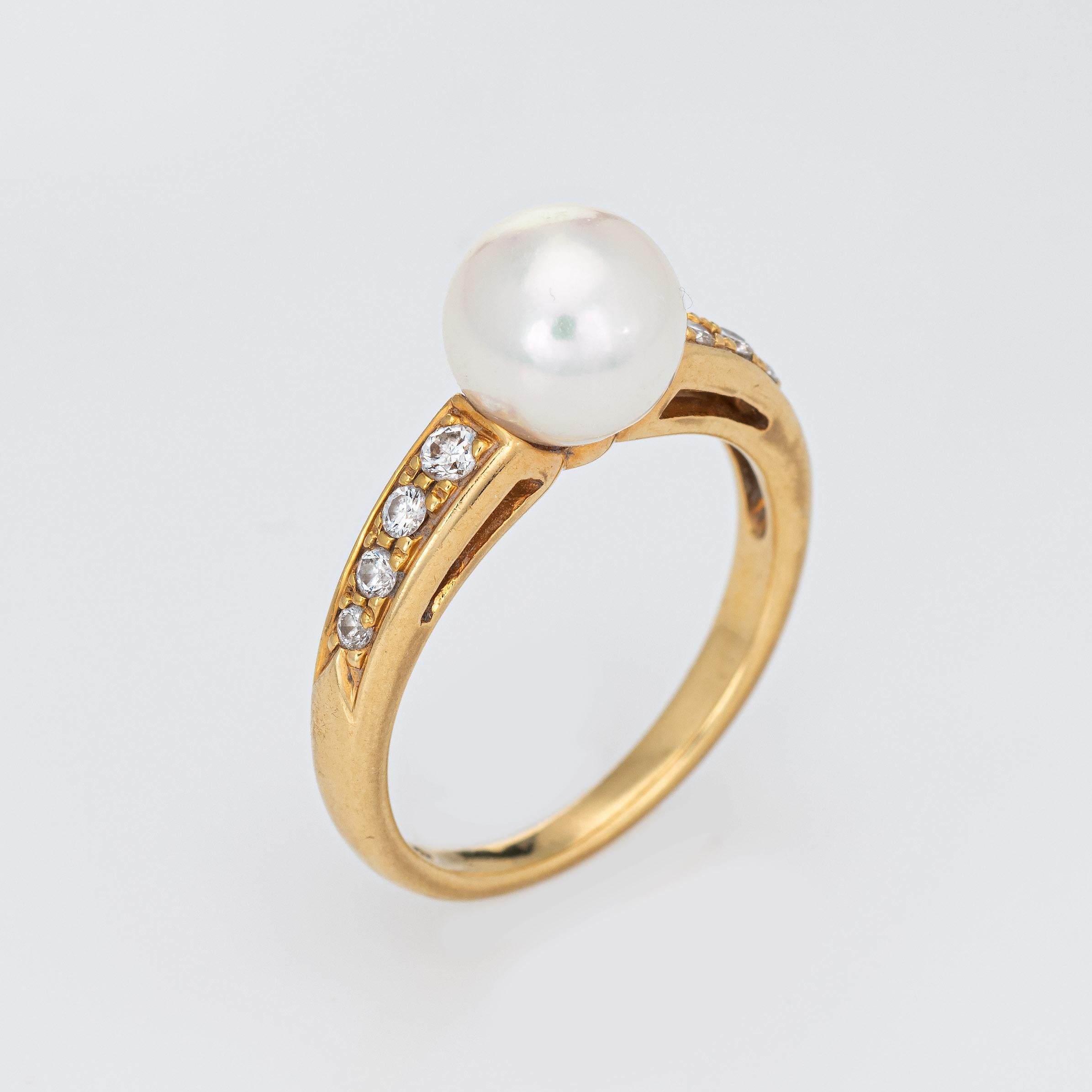 Elegant Mikimoto cultured Akoya pearl & diamond ring crafted in 18k yellow gold. 

8mm cultured Akoya pearl is accented with an estimated 0.20 carats of diamonds (estimated at G-H color and VS clarity). The pearls is lustrous and show rose