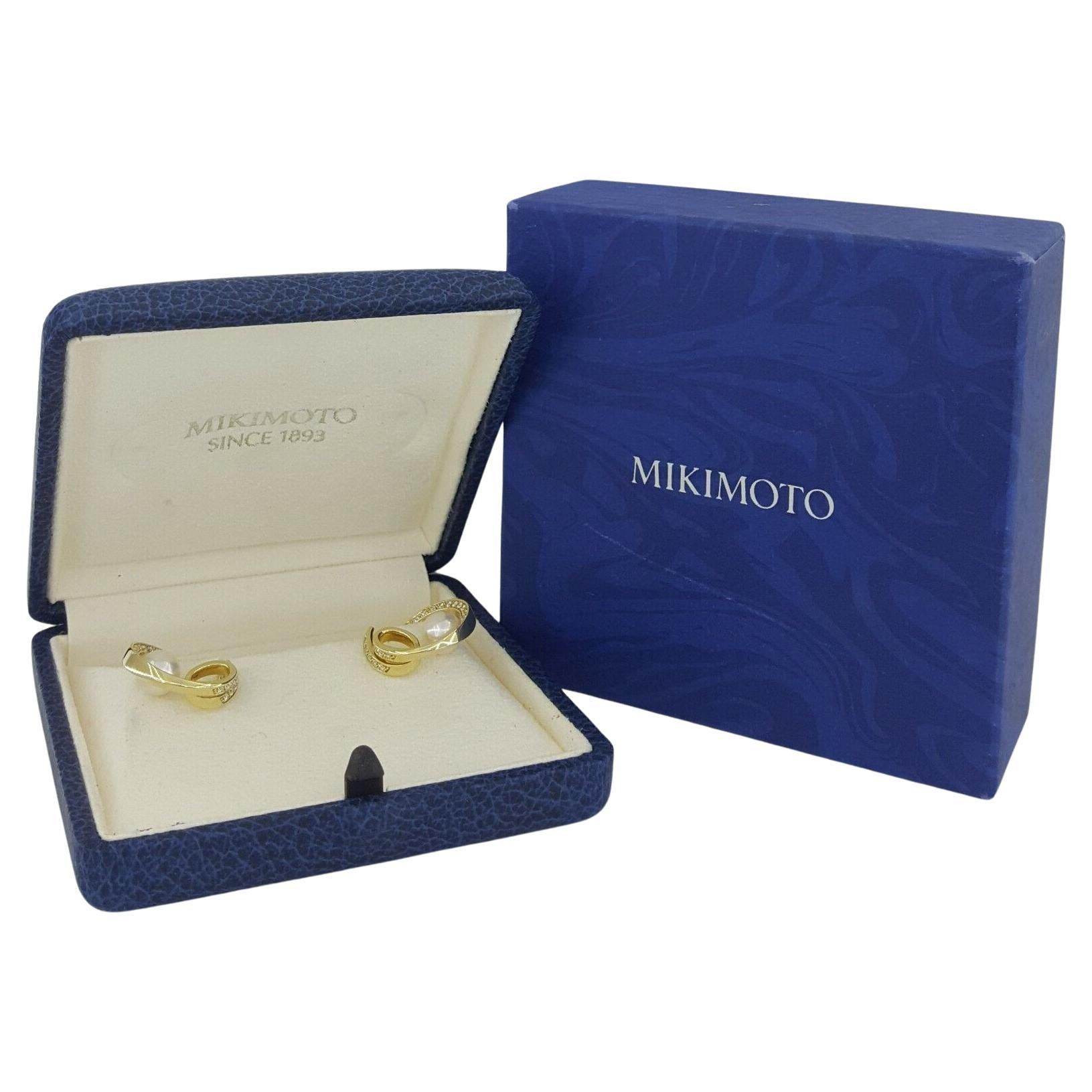 Mikimoto 18k Gelbgold 7.5mm Akoya Perle & ~0.9 ct Diamanten Kreis Loop Ohrringe.



Die Ohrringe wiegen 10,5 Gramm und haben einen Durchmesser von 21 mm.