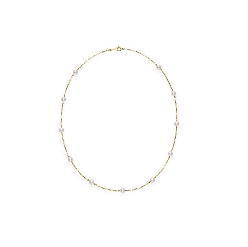 Mikimoto 18 inch Akoya Cultured Pearl Station Necklace in 18k Yellow Gold Mikimoto's Station Collection offers variety to everyday wear. 
The pieces are designed to be worn on their own as a statement, or layered with other classic Mikimoto designs
