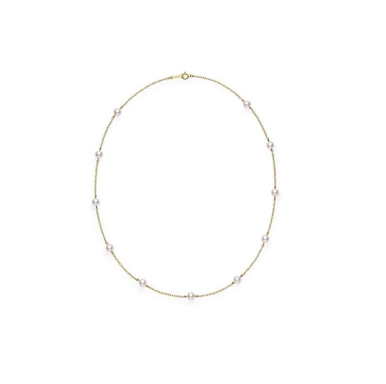 Mikimoto 18 inch Akoya Cultured Pearl Station Necklace in 18k Yellow Gold Mikimoto's Station Collection offers variety to everyday wear. 
The pieces are designed to be worn on their own as a statement, or layered with other classic Mikimoto designs