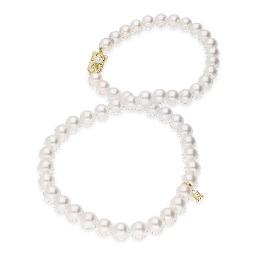 Mikimoto Akoya Cultured Pearl Strand Necklace in 18k Yellow Gold Clasp. 
This 20 inch Akoya cultured pearl strand features anywhere from 5.5-6mm Akoya cultured pearls with a Mikimoto signature clasp in 18K Yellow gold. 
Quality A 
length 20 inch