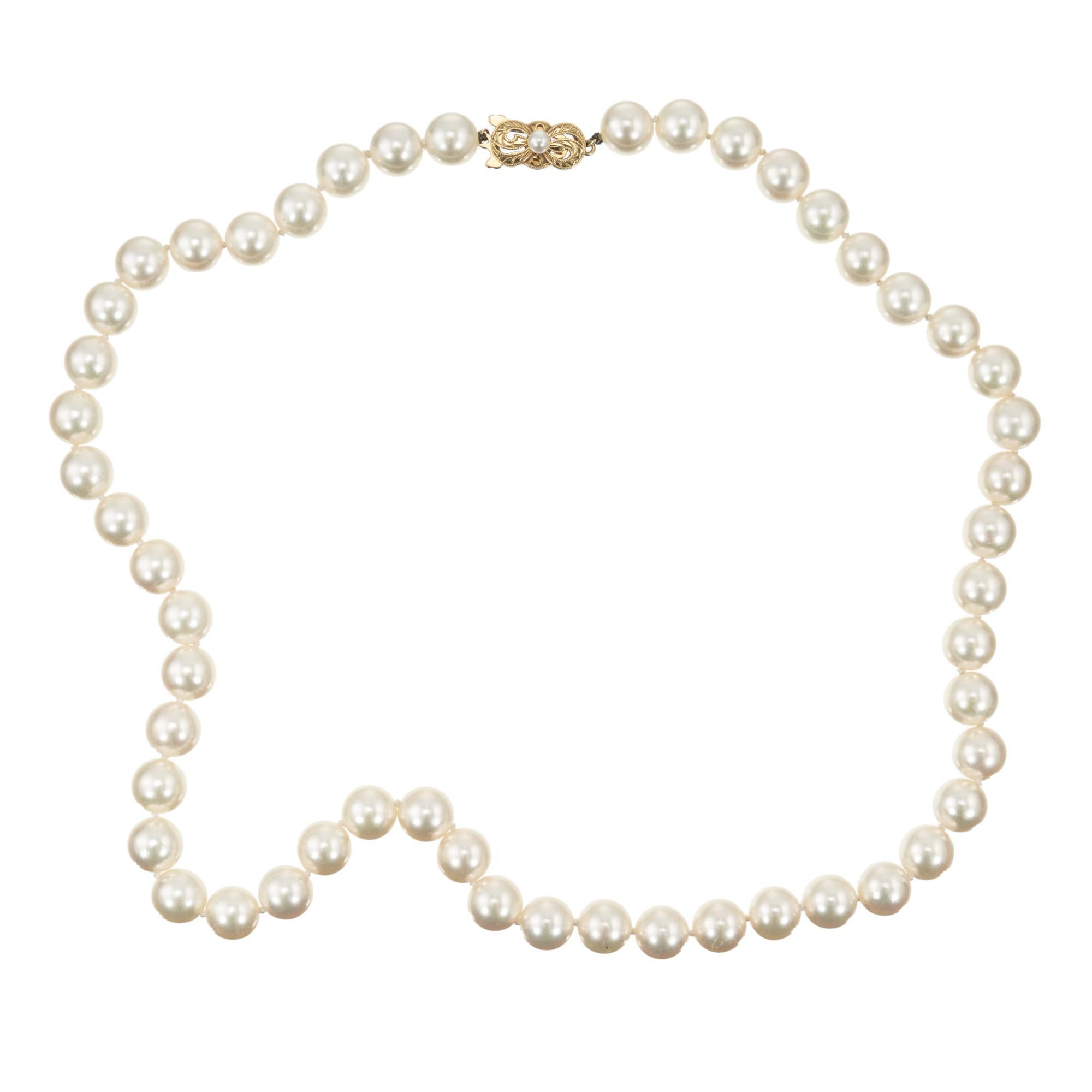 Classic strand of pearls from one of the world's finest cultured pearl growers. 20 Inches, 51 9mm-9.5mm pearls. The pearls are white with creme and pink overtone natural color. Well matched pearls with the signature unique MIkimoto catch in 18k