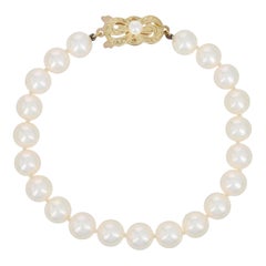 Mikimoto Akoya Pearl Bracelet, 18 Karat Gold Knotted Strand with Box