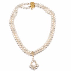 Collana a doppio filo MIKIMOTO con perle Akoya, diamanti e oro 18 carati