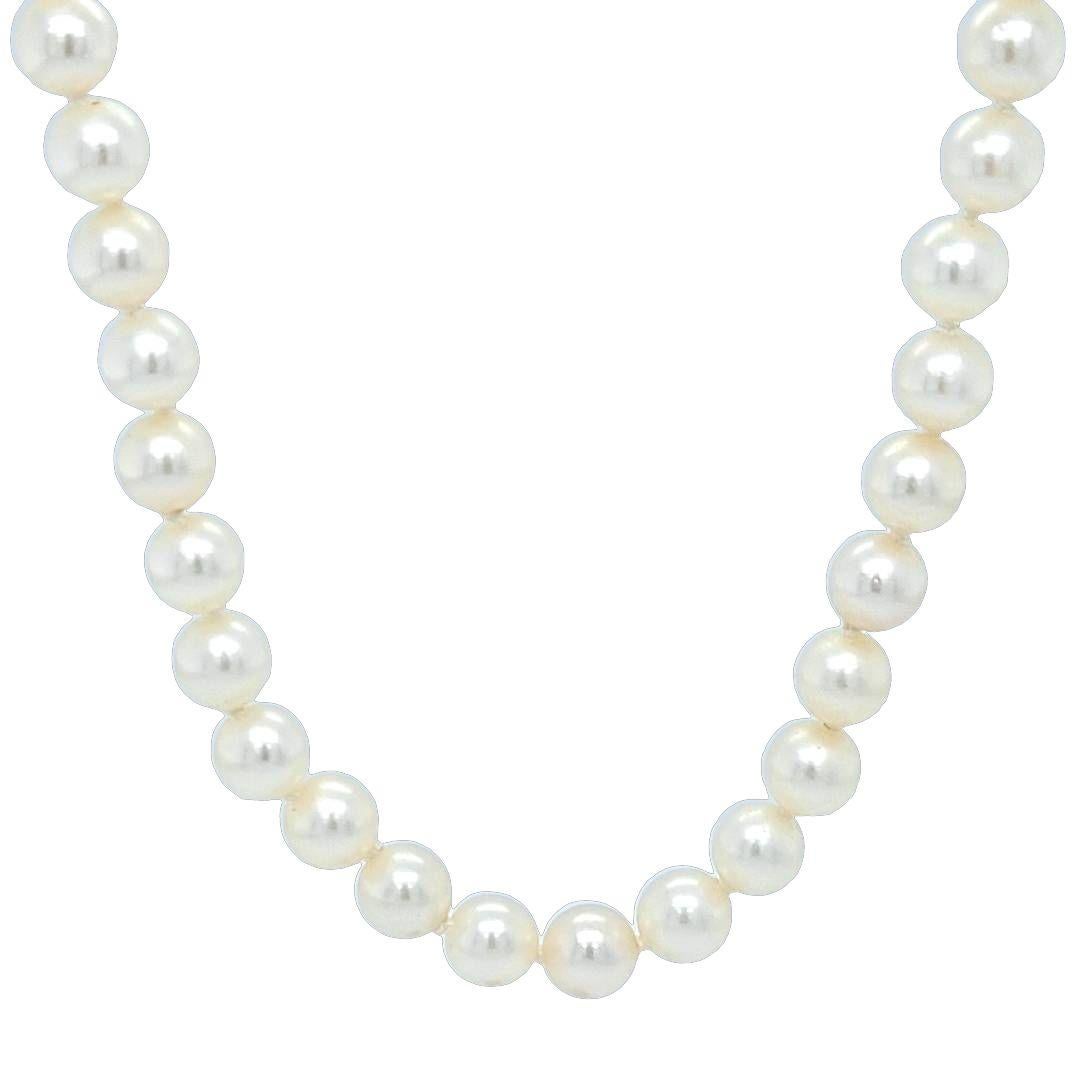 Mikimoto 18 Karat White Gold Cultured Pearl Necklace Featuring 58 6mm to 6.4mm Akoya Pearls Strung on Knotted Silk Measuring 16 Inches Long. $4,000 MSRP. Includes Mikimoto Pearl Folder.