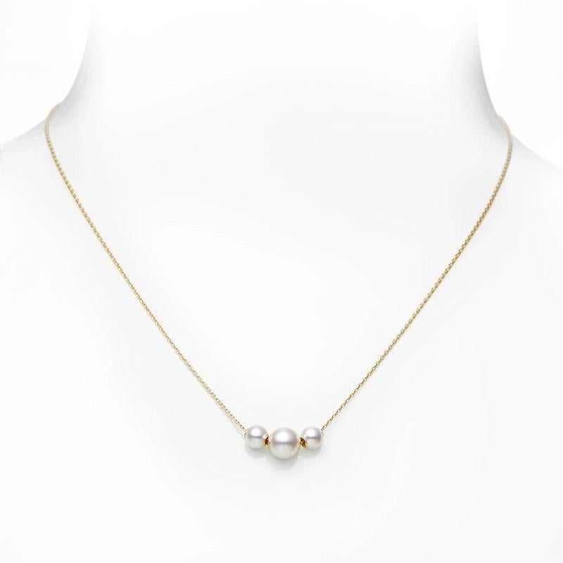 The Mikimoto MPQ10081AXXK Akoya Pearl Station necklace features three Akoya cultured pearls ranging from 5.5 - 7.5mm with A+ quality on an 18