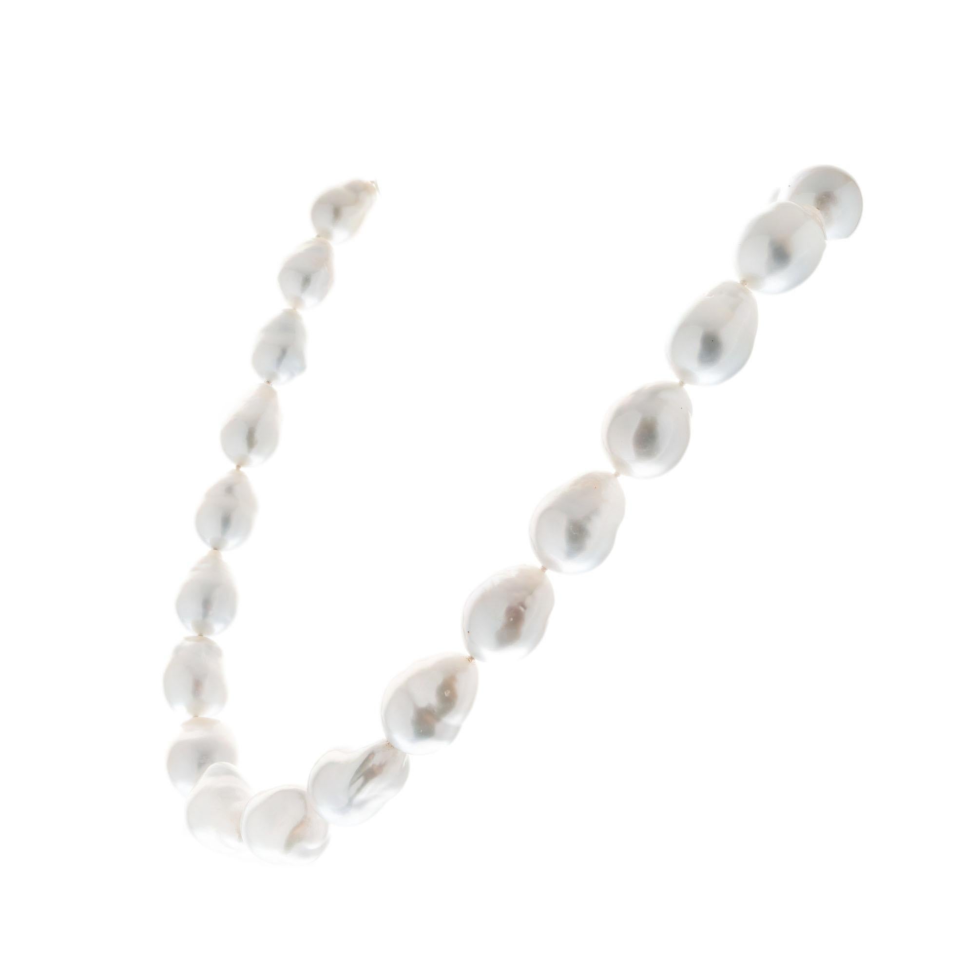 Mikimoto Baroque South Sea Pearl Gold Necklace. 25 baroque pearls with a Mikimoto round 18k white gold  ball clasp. 18.50 inches long. 

25 south sea baroque pearls, 15.5x13mm- 19.5x16mm
1 round diamond 
Length: 18.50
18k white gold
Stamped: