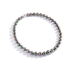 Collana Mikimoto con perla nera e diamanti in oro bianco 18 carati