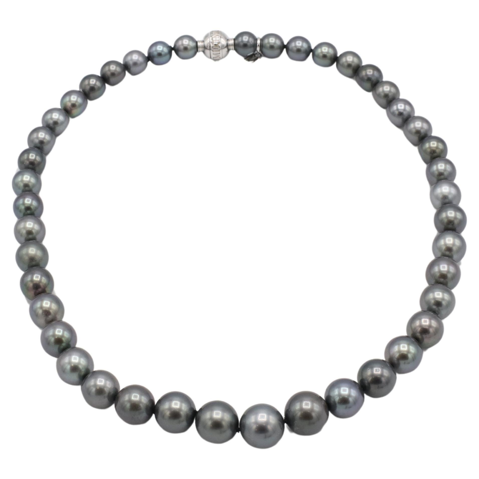 Mikimoto Black South Sea Cultured Pearl Necklace 18 Karat White Gold Diamond Clasp 
Metal: 18k white gold
Weight: 59.4 grams
Length: 17 inches
Pearls: 8 - 11mm
Diamond: Approx. 0.02 CT F VS round natural diamond
Retail: $14,000 USD
