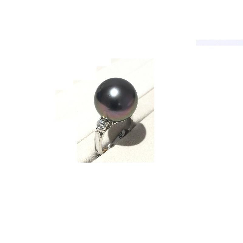 Mikimoto Black South Sea Pearl and Diamond Ring 
18k White Gold 
Pearl 15mm
Diamond 0.44 carat total weight 
Ring Size 6 3/4
MRA10014BDXP