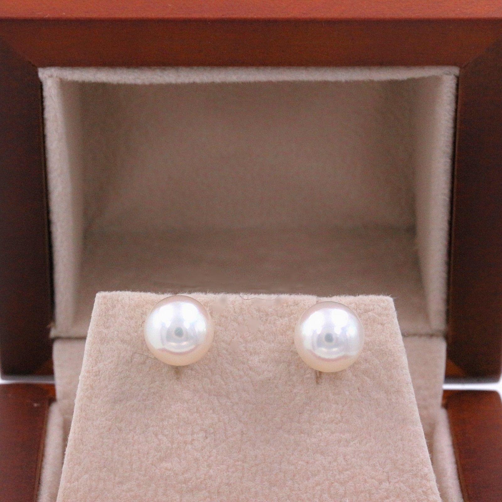 MIKIMOTO
Style: Cultured Akoya Pearl Stud Earrings
Metal:  18k White Gold
Size:  7.5 MM Pearl Size
Color:  White Luster
Hallmark:  Mikimoto signature M 750
Includes:  Elegant Earring Box

Retail Value:  $1,060

SKU#1441TBN100117gVV15