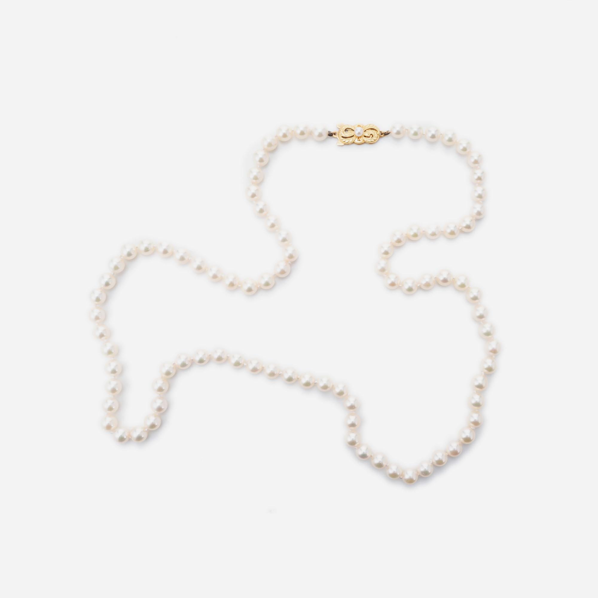 Mikimoto 24 Inch cultured pearl necklace with a 18k yellow gold catch

87 cultured crème pearls, 6.3-6.5mm
1 cultured crème pearl, 3.5mm
18k yellow gold 
Stamped: 750
Hallmark: M
32.5 grams
Length: 24 Inch
Width: 6.3mm
Depth: 6.4mm
