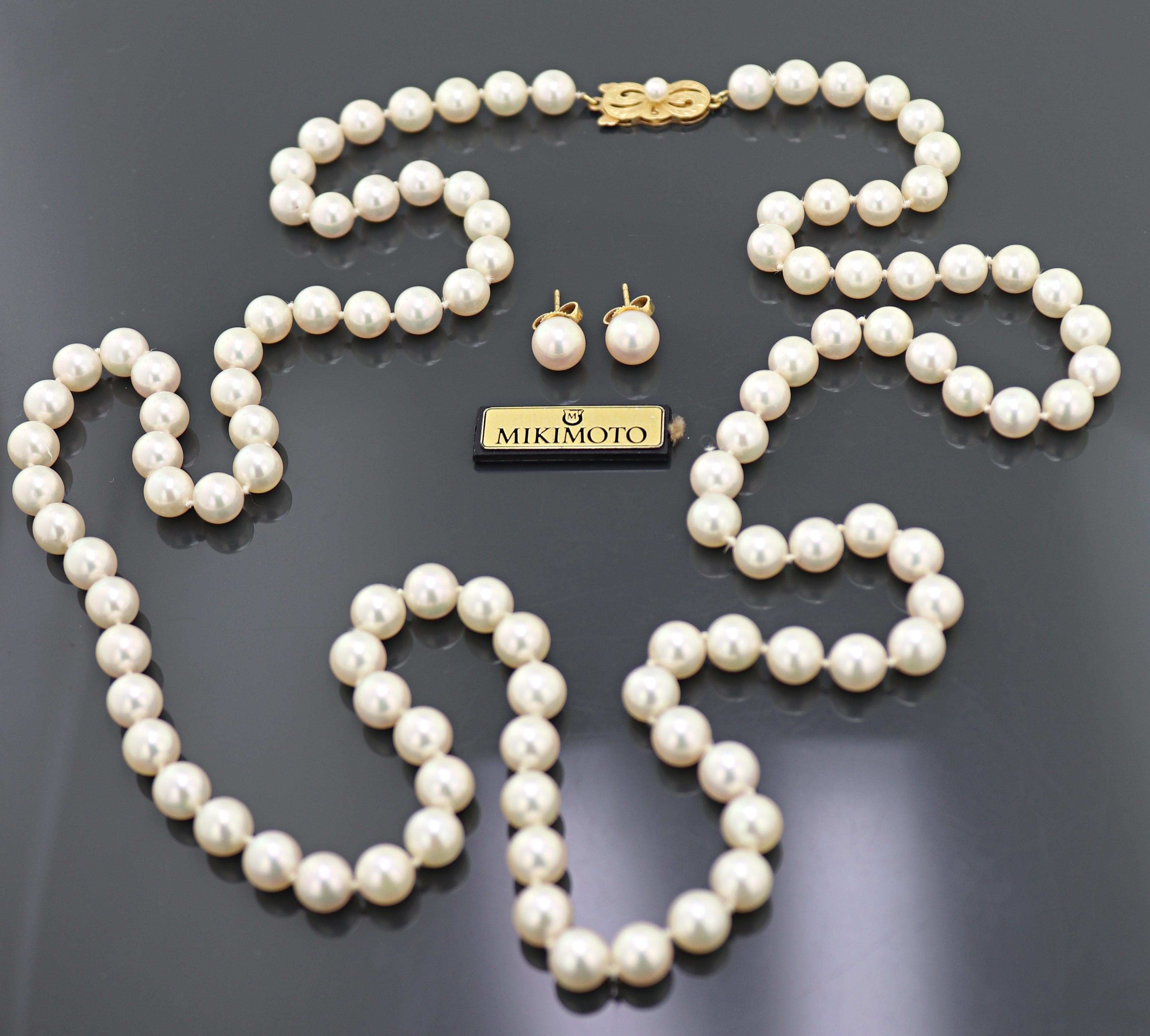 Composed of  106,  7 to 6.5 mm Akoya cultured pearls, completed by a 3.4
mm cultured pearl, 18k yellow gold Mikimoto clasp, forming a 30 inch
necklace; together with a pair of Mikimoto 7.0 mm 18k yellow gold stud
earrings, Gross Weight 49.61 grams.