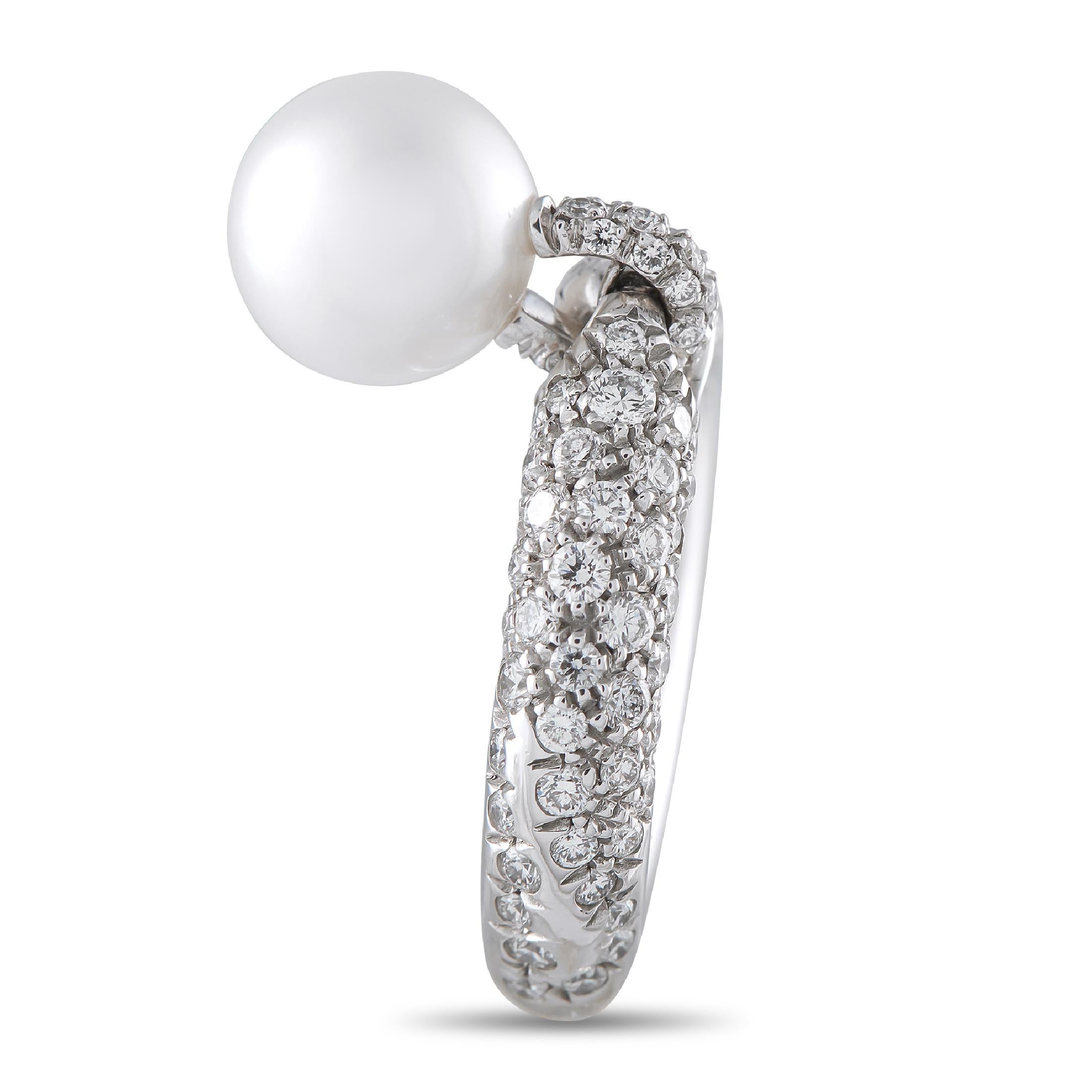 Elegant and understated in design, this Mikimoto Delo ring defies convention. The simple 18K White Gold band shines to life thanks to inset Diamonds with a total weight of 1.70 carats. A luminous 9.5mm Pearl is suspended below, adding movement and