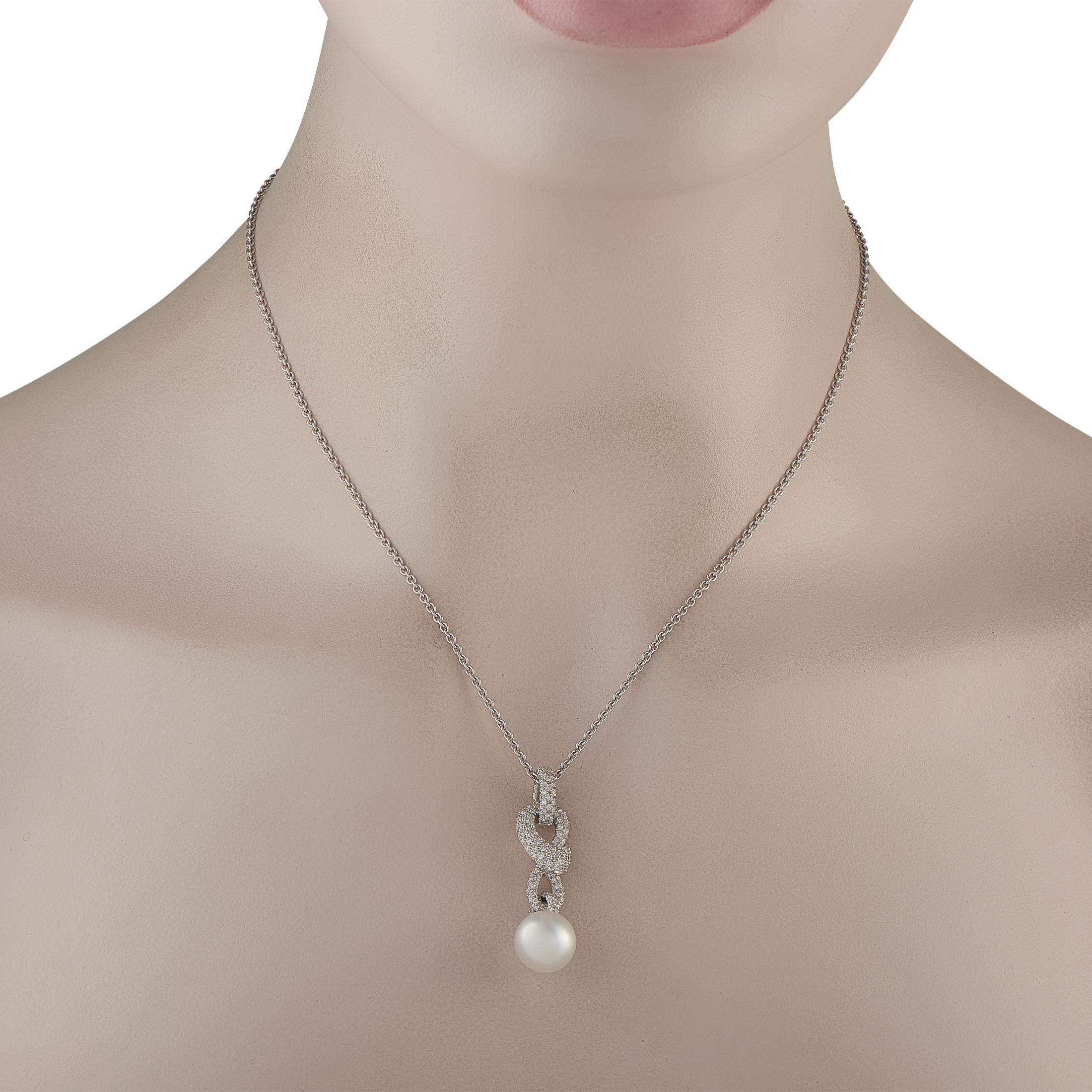 This Mikimoto Desmos necklace is a sophisticated accessory that will elevate any ensemble. On this piece, an 18K White Gold pendant features a graceful, ribbon-like design. Sparkling Diamonds totaling 1.35 carats allow it to seemingly emanate light,
