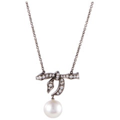 Mikimoto Diamond and White Pearl Bow White Gold and Black Rhodium Pendant