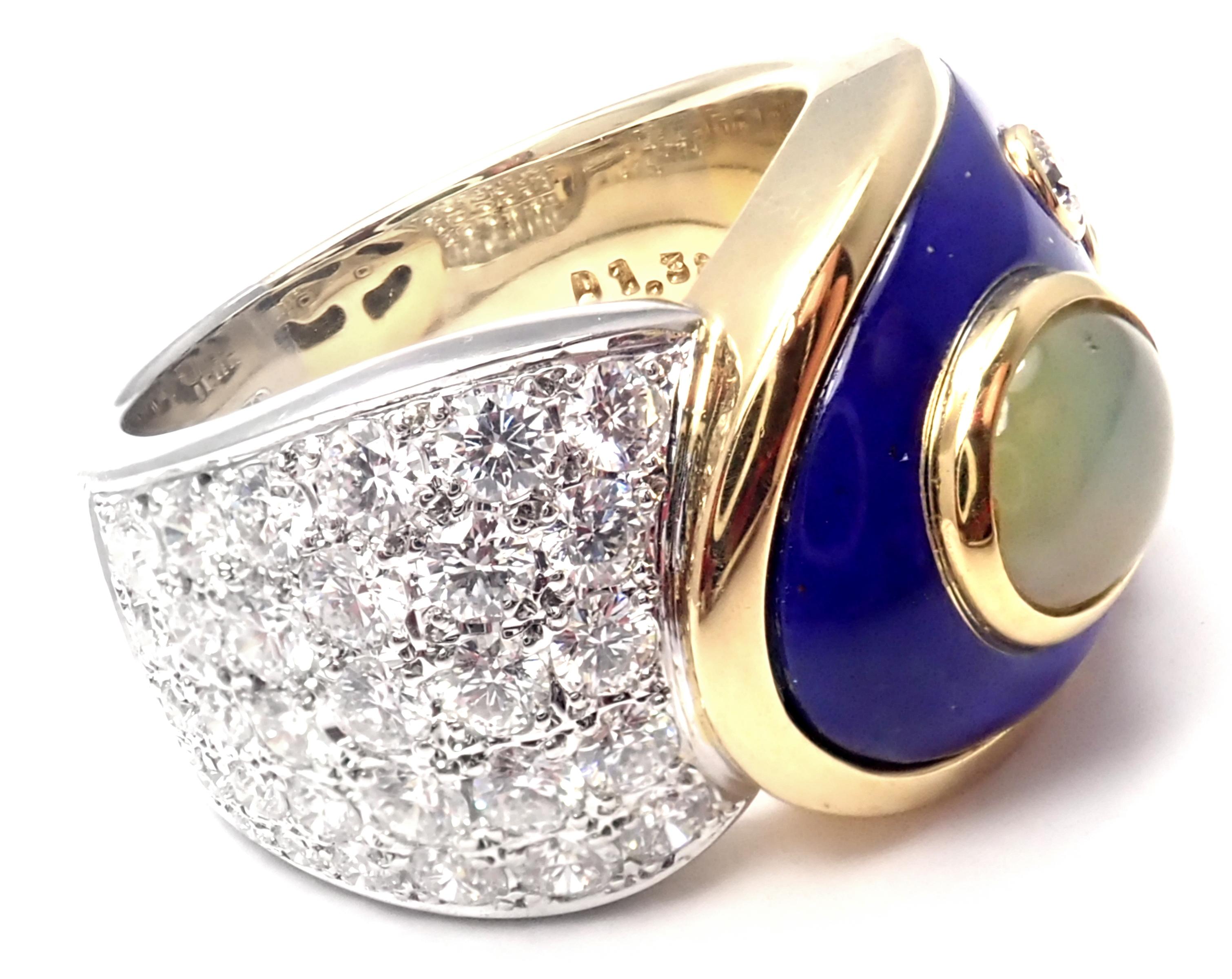 Platinum And 18k White Gold Diamond Cats Eye Blue Enamel Band Ring by Mikimoto. 
With Diamonds VS1 clarity, G color total weight approximately .3.45ct
1 Cat's Eye 7mm x 9mm
Details: 
Ring Size: 7
Weight: 23.4 grams
Width: 15mm
Stamped Hallmarks: