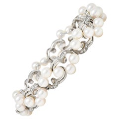 Vintage Mikimoto Diamond Cultured Pearl 14 Karat White Gold Scrolling Ribbon Bracelet