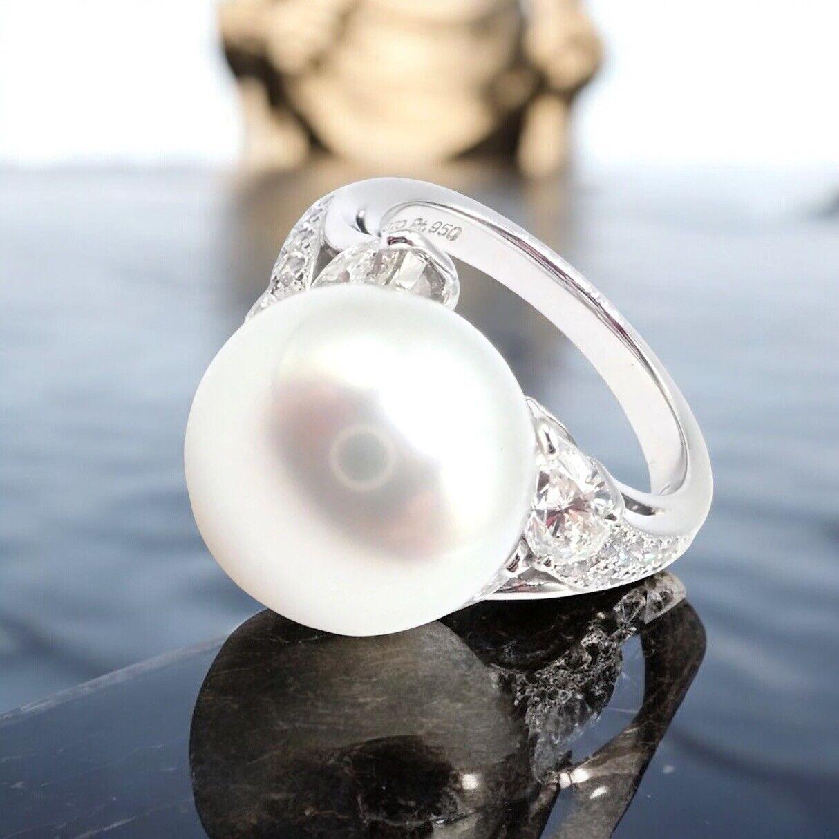Platinum Diamond Large 12.5mm South Sea Pearl Ring by Mikimoto. 
A stunning Rare Authentic Mikimoto ring features a large 12.5mm South Sea pearl with a luminous sheen, set in elegant platinum. 
Accented by sparkling diamonds, this exquisite piece