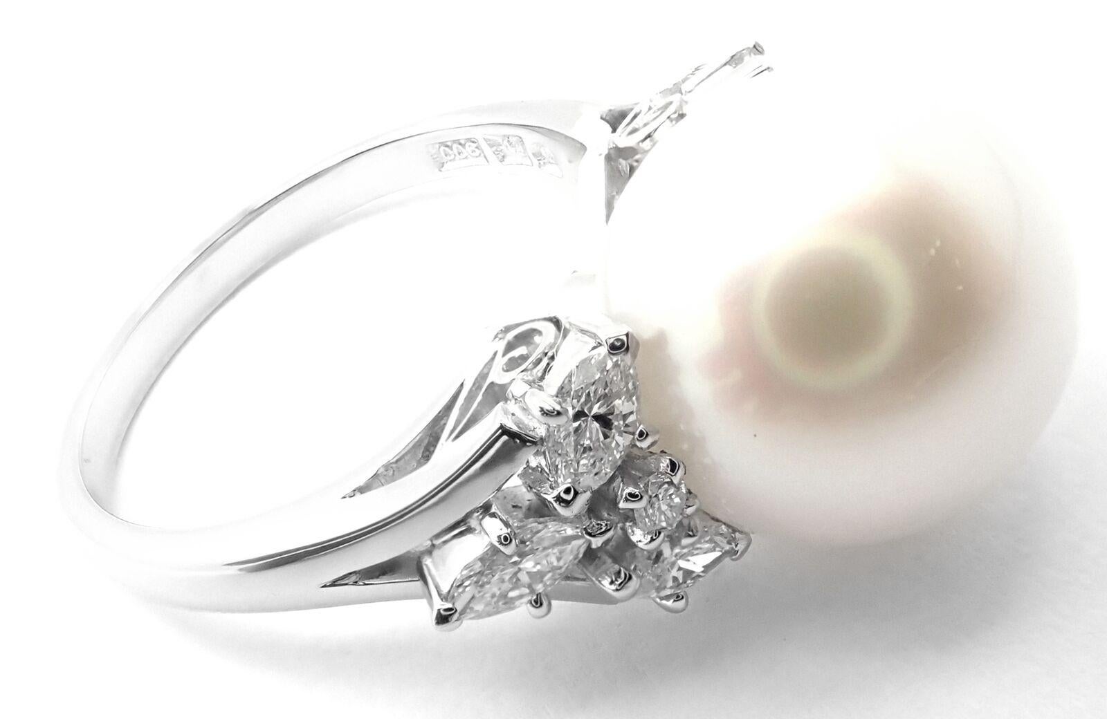 Platinum Diamond Large 12mm South Sea Pearl Ring by Mikimoto. 
With 8 round and marque shape brilliant cut diamonds VS1 clarity, E color diamonds total weight approx. 0.65ct
1 x 12mm South Sea Pearl 
Quality Grade A+
Details: 
Ring Size: 5.5
Weight: