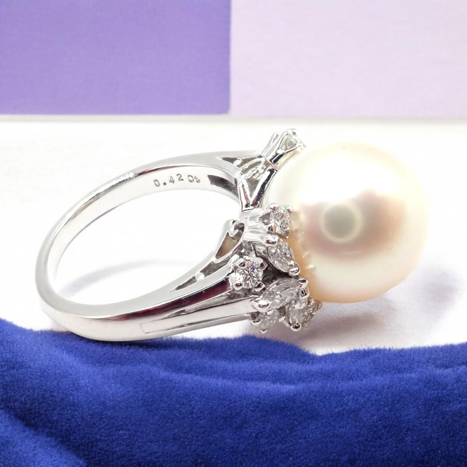 Platinum Diamond Large 12mm South Sea Pearl Ring by Mikimoto. 
The Authentic Mikimoto Platinum Diamond Large 12mm South Sea Pearl Ring features a magnificent 12mm South Sea pearl, renowned for its exceptional luster. 
Set in platinum, the pearl is