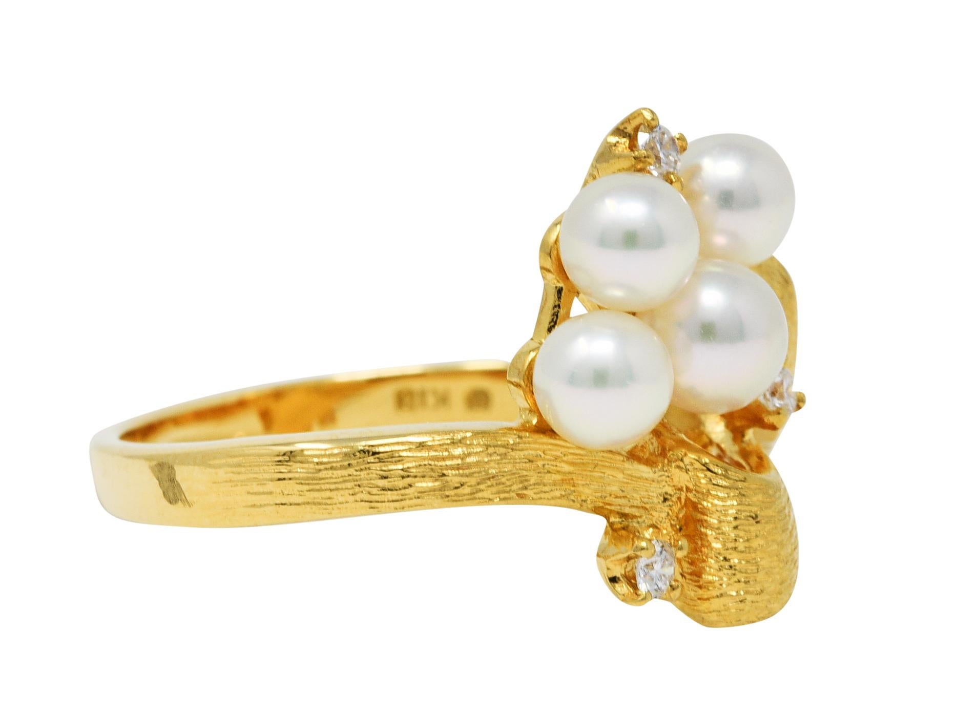 Ring is designed as a looping ribbon with a fine gold bark texture

Featuring a cluster of round cultured pearls measuring 4.0 mm to 4.5 mm

Very well matched in white body color with strong rosè overtones and excellent luster

Accented by round