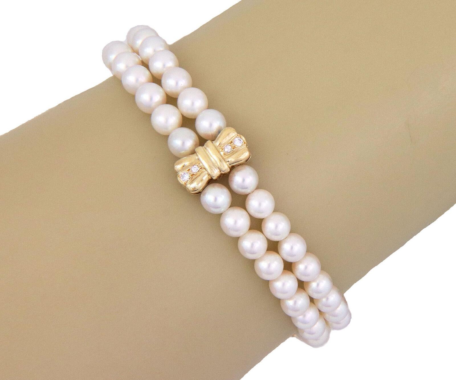 Mikimoto Diamond Pearls 18k Yellow Gold Bow Motif 2 Strand Bracelet In Excellent Condition For Sale In Boca Raton, FL