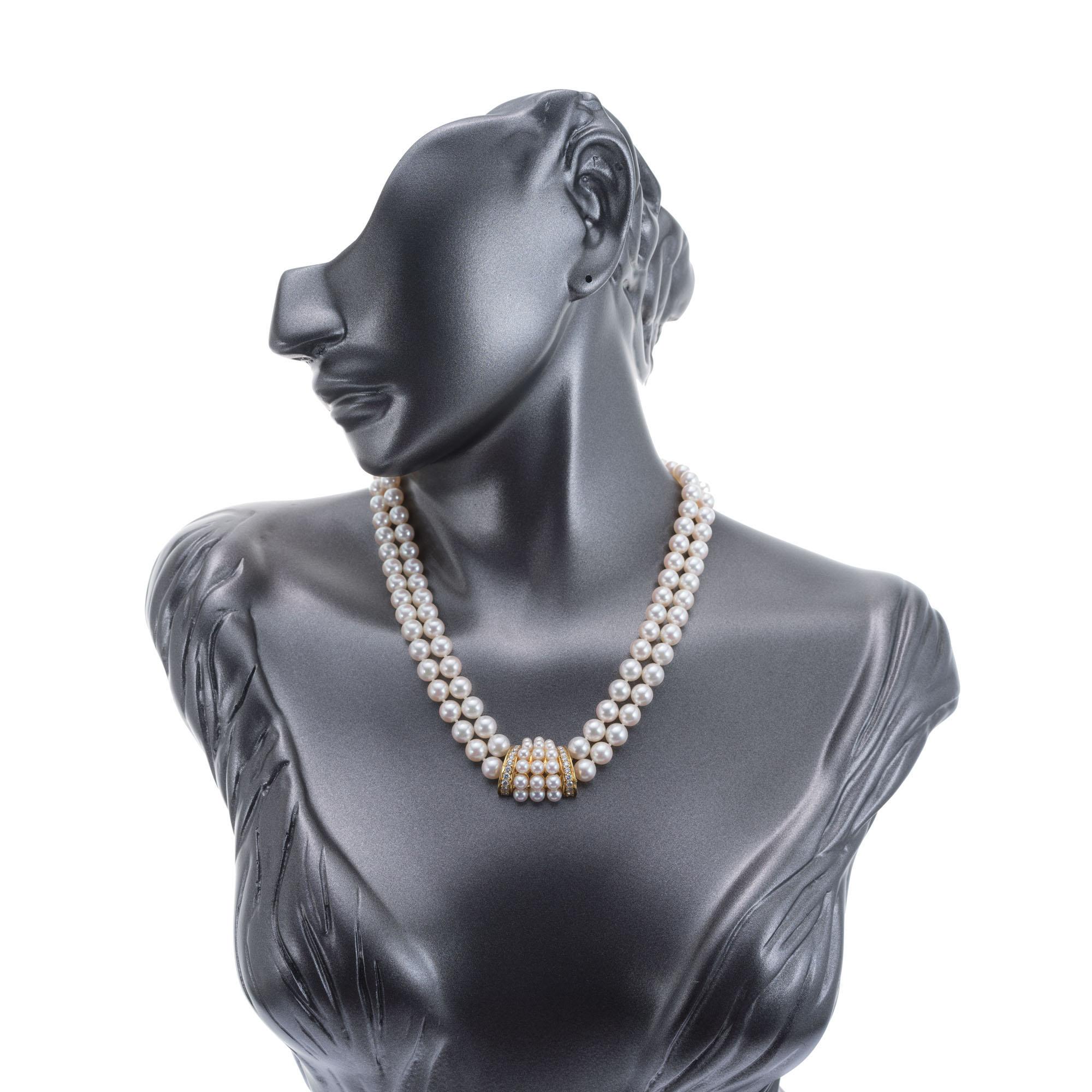 1960's Authentic certified Mikimoto double strand cultured pearl diamond necklace. Japanese cultured pearls with 22 full cut accent diamonds. 17-18 inches in length. Appraisal and restringing at Mikimoto. Stamps on back of catch and center section.