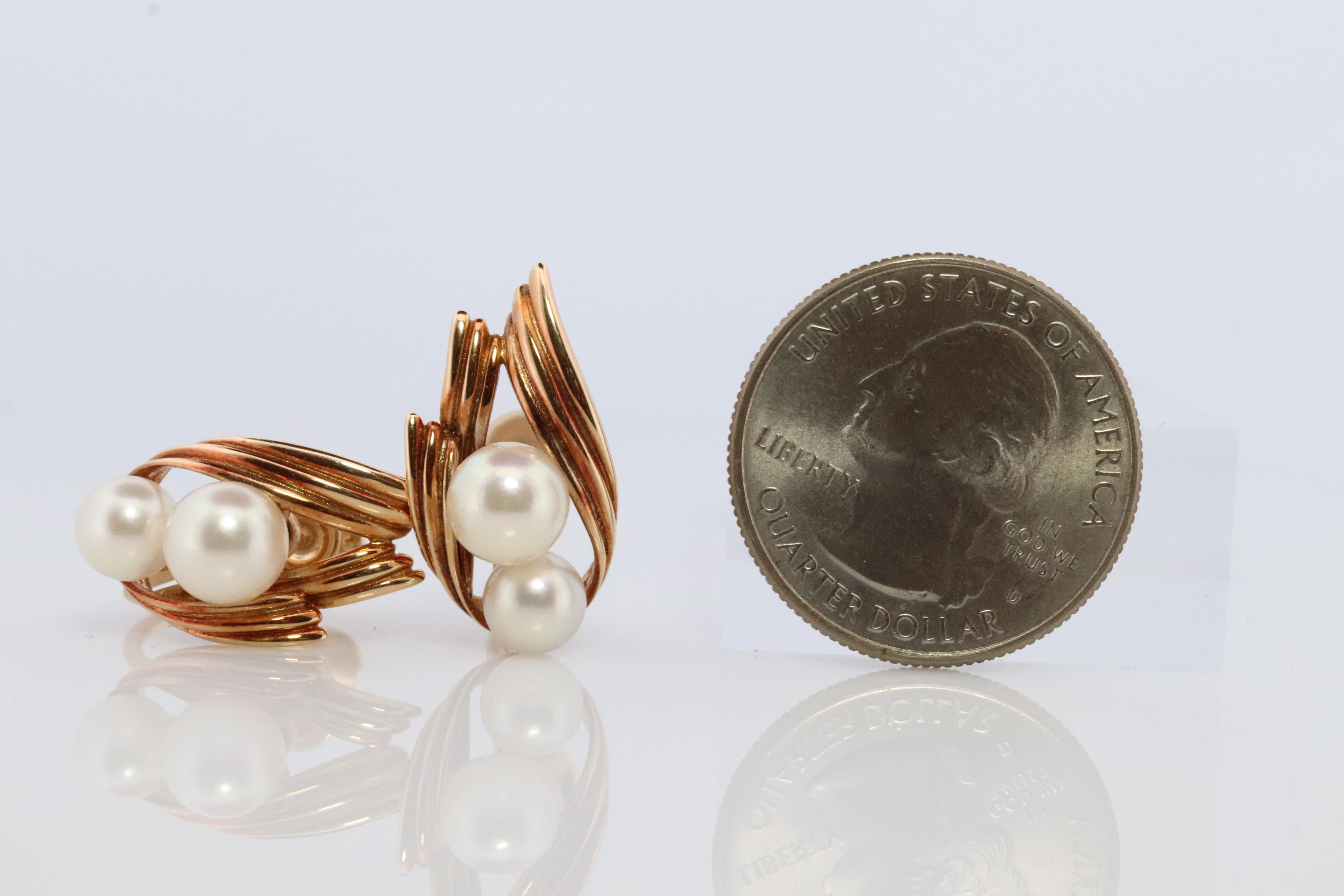 Stunning Designer earrings. World Renowned MIKIMOTO pearls. A cluster of Akoya pearls designed for unpierced ears.

Pearls have amazing luster. Mid-century design. 

Screw Backs.
Condition: Shows limited signs of wear

Details:
6mm to 7mm Akoya