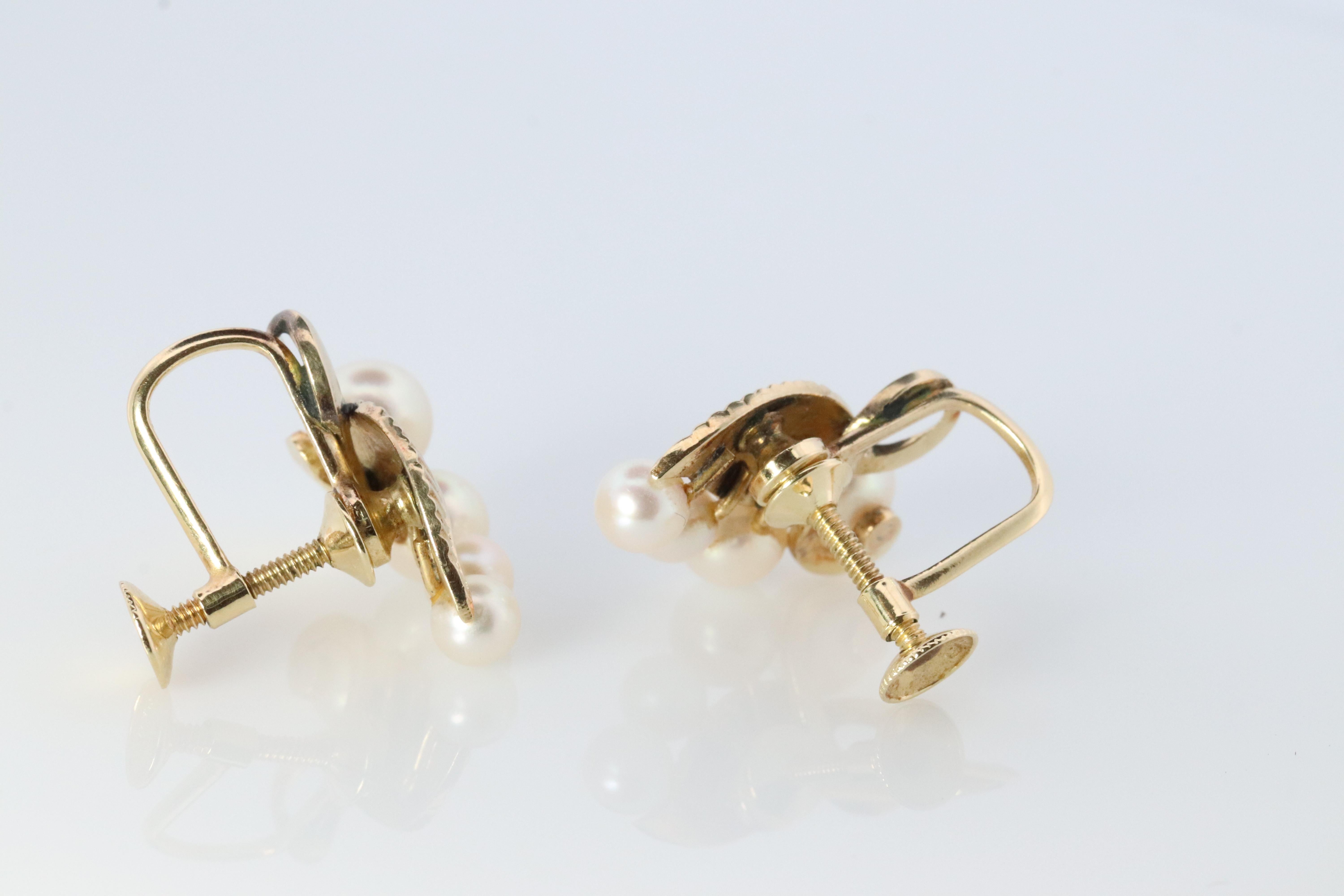 Mikimoto Earrings. Vintage 14k Gold Mikimoto Pearl cluster Clip Ons. Unpierced In Good Condition For Sale In Port Charlotte, FL