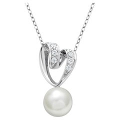 Mikimoto Halskette mit Herzanhänger aus achtzehn Karat Perlen und Diamanten