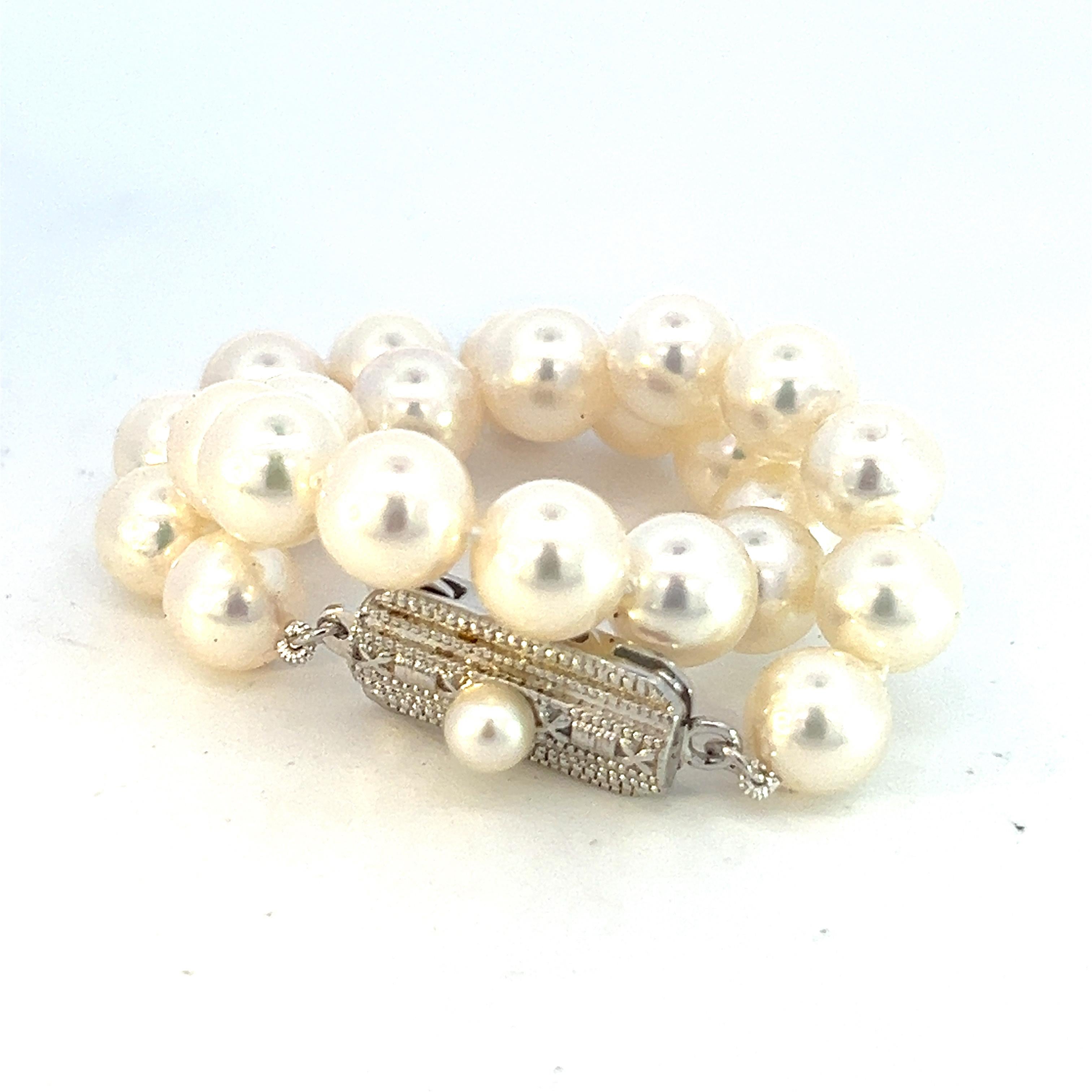 Authentic Mikimoto Estate Akoya Pearl Bracelet 7.25 Silver 6.5 - 7 mm M355

Please look at the video attached for this item. With the video, you can see the movement of the item and appreciate the faceting and details better.

This elegant Authentic
