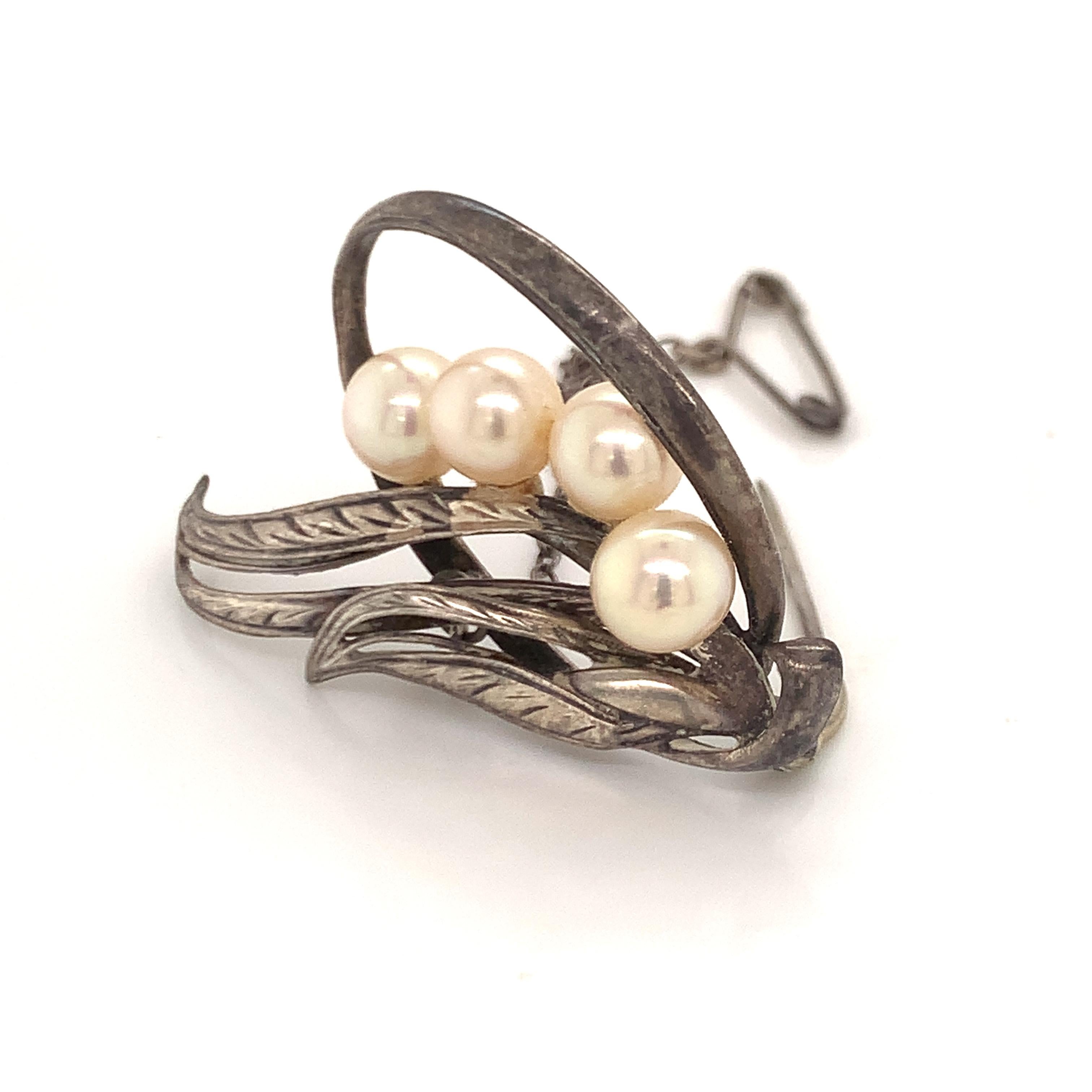 mikimoto brooches pins