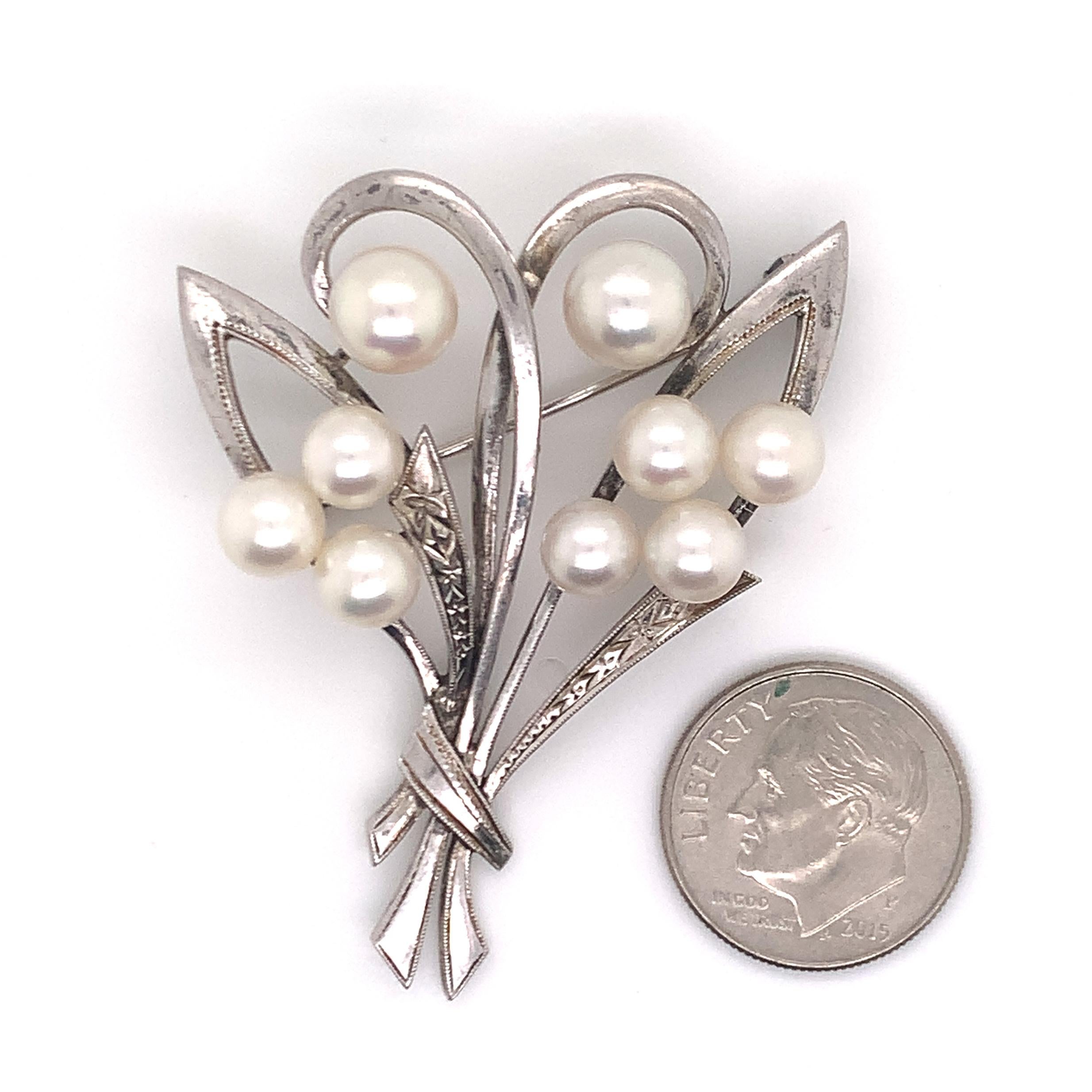 mikimoto brooches pins