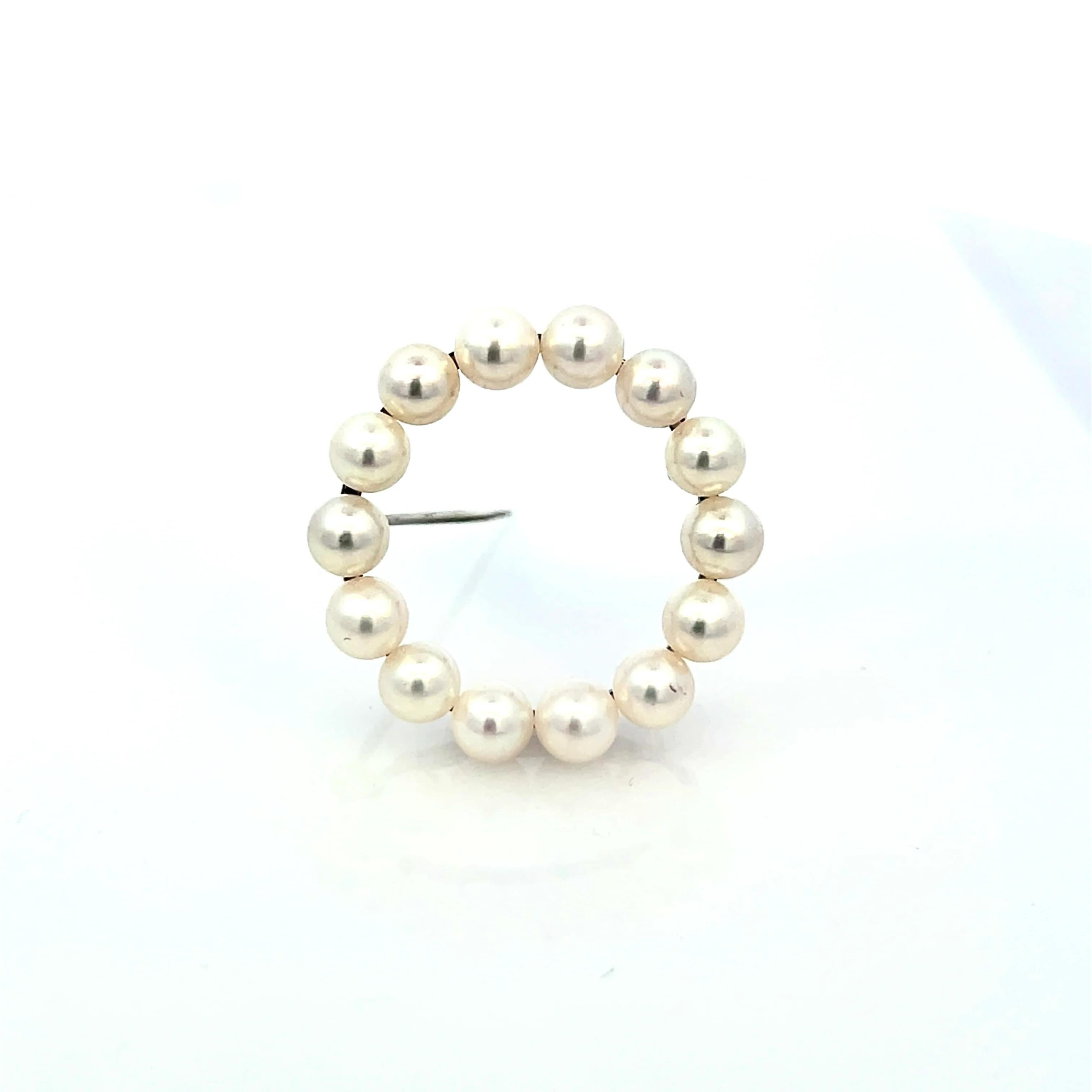 Authentic Mikimoto Estate Akoya Pearl Circle Wreath Brooch Pin Sterling Silver M426

This elegant Authentic Mikimoto Estate sterling silver brooch has 14 Saltwater Akoya Cultured Pearls in size of 5 mm with a weight of 4.48Grams.

TRUSTED SELLER