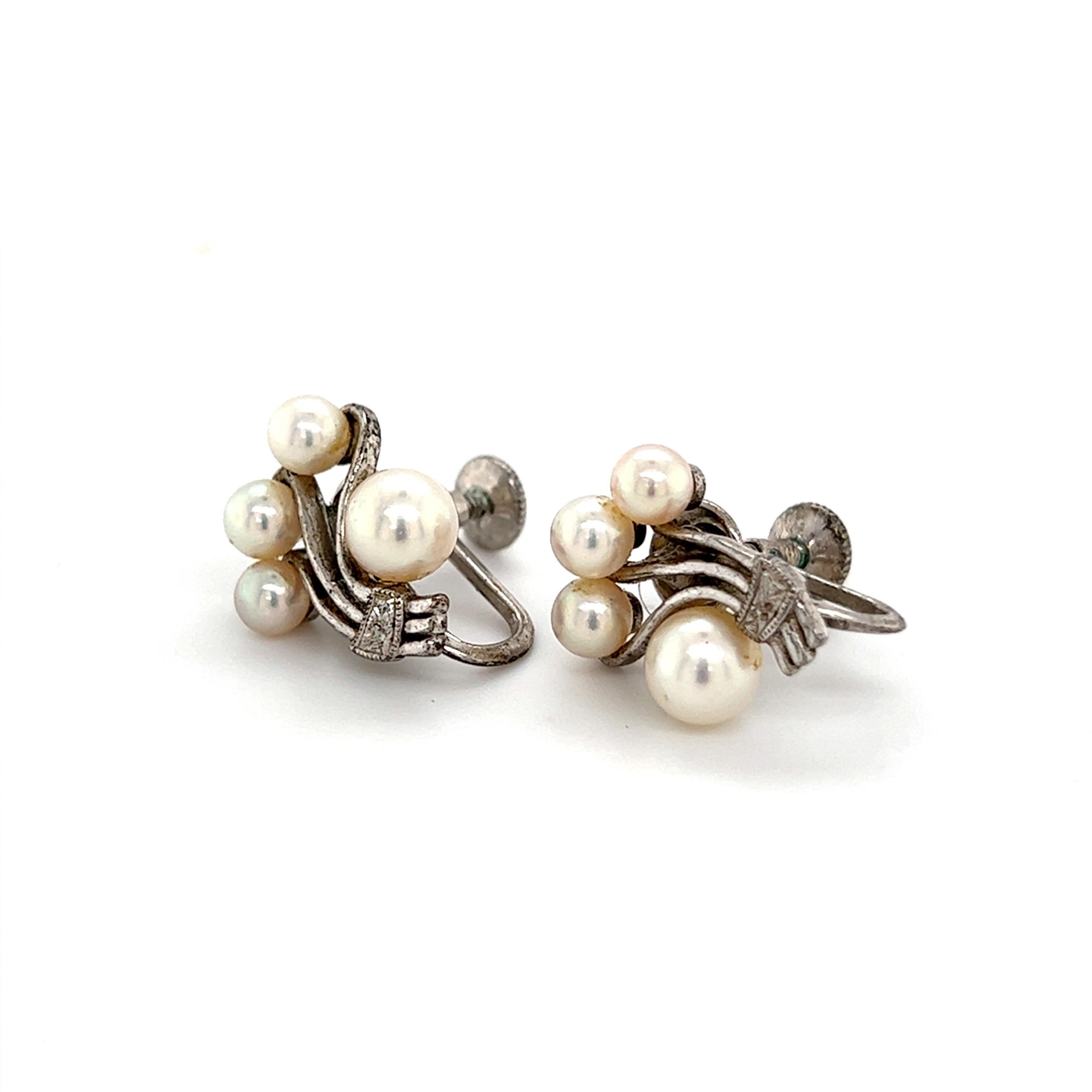 Mikimoto Estate Akoya Pearl Earrings Sterling Silver 5.75 mm 4.5 Grams M253

These elegant Authentic Mikimoto Estate Akoya pearl earrings are made of sterling silver and have 8 Akoya Cultured Pearls ranging in size from 4.2 - 5.75 mm with a weight