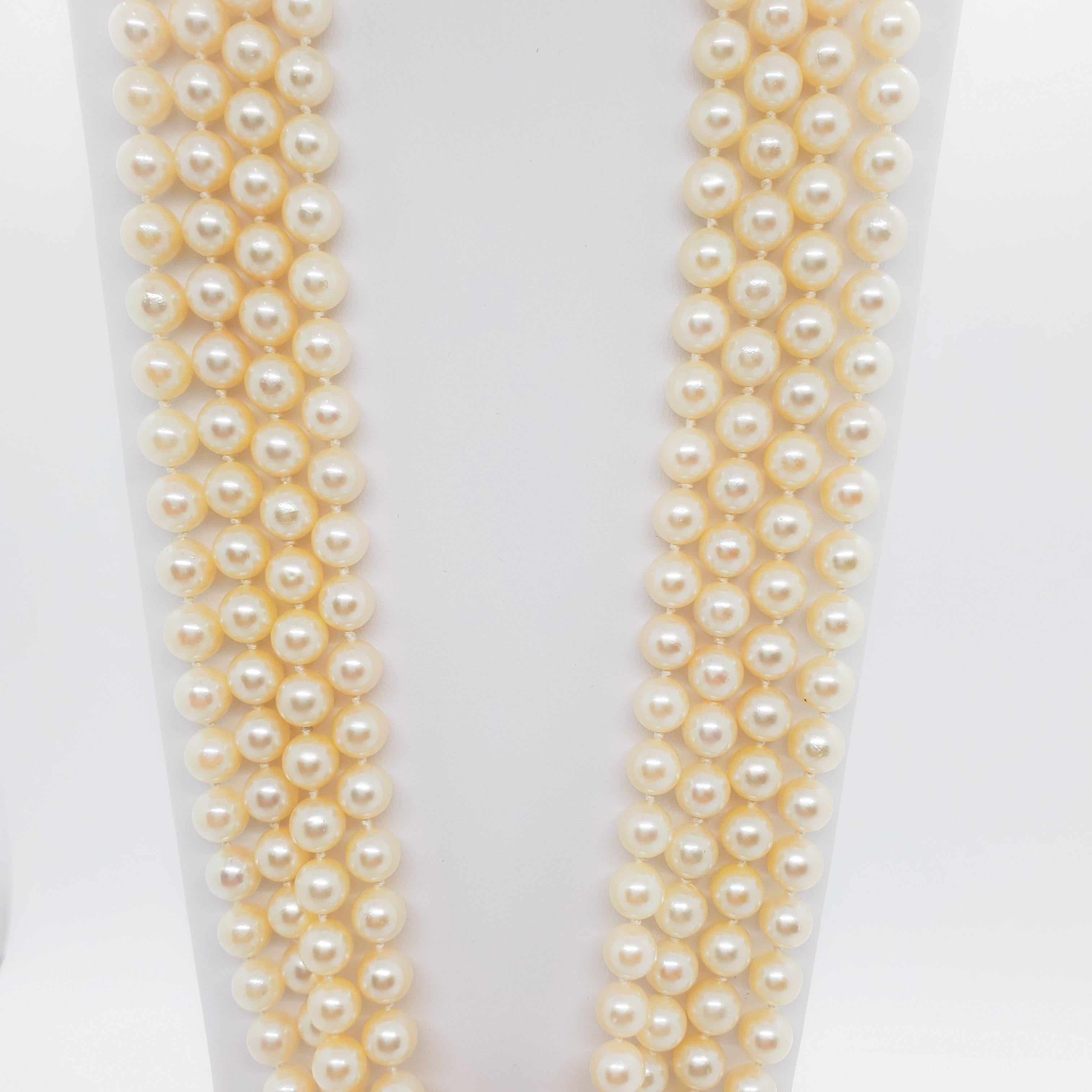 Gorgeous Mikimoto round Akoya pearl necklace with a classic 18k yellow gold clasp.  Length is 36