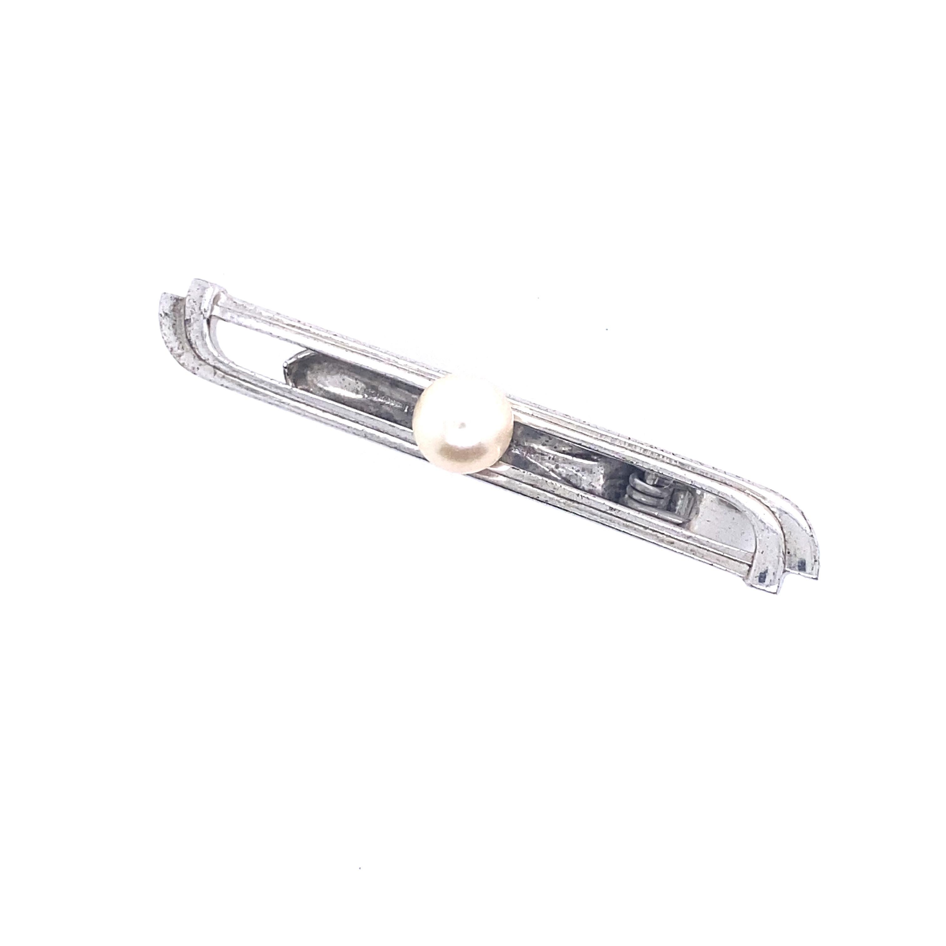 Mikimoto Estate Akoya Pearl Tie Bar Sterling Silver 6.73 mm 5.91 Grams M172

This elegant Authentic Mikimoto Estate Akoya pearl tie bar is made of sterling silver and has 1 Akoya Cultured Pearl in size of 6.73 mm with a weight of 5.91