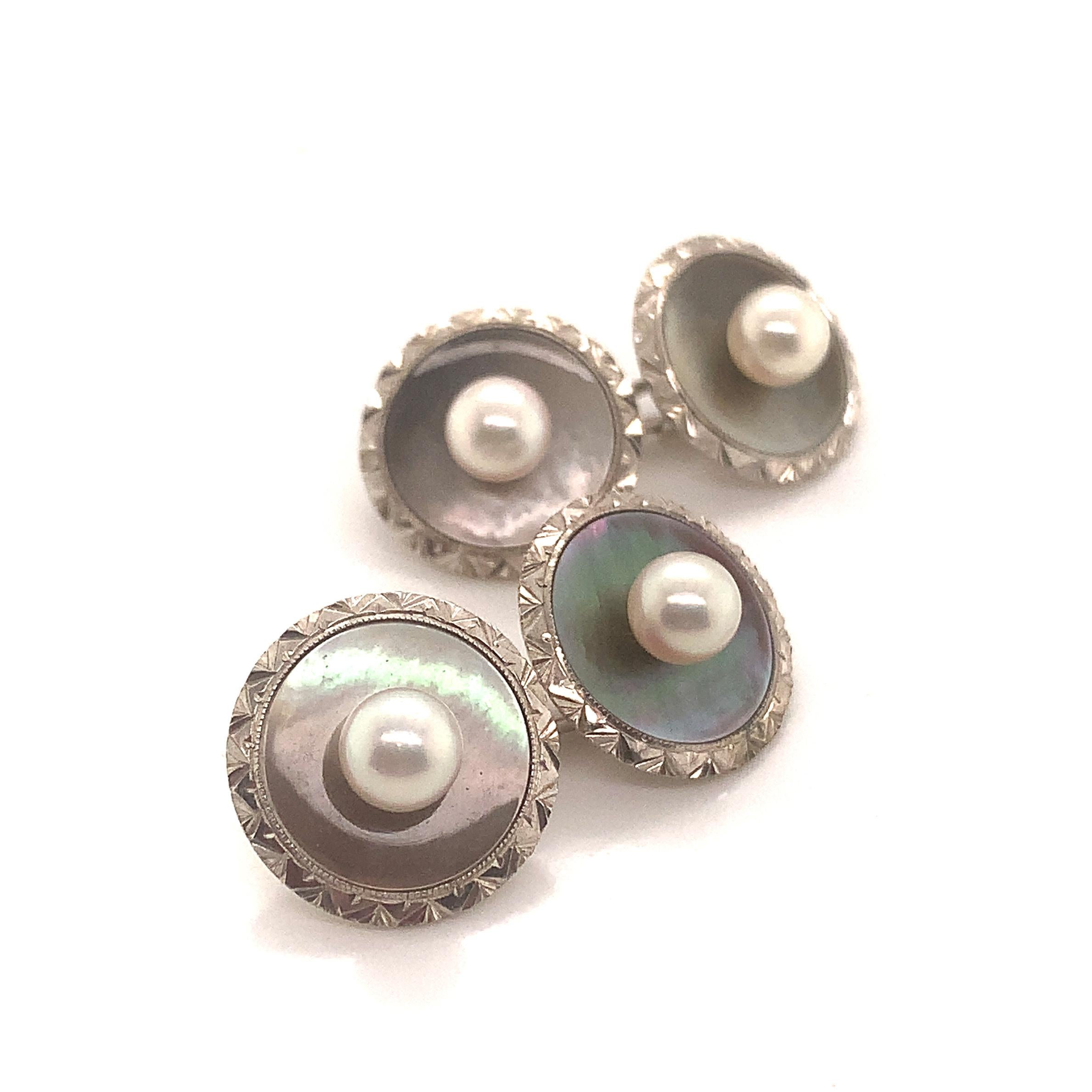 Mikimoto Estate Akoya Pearl Tuxedo Cufflinks Set Sterling Silver 5.5 mm 10.364g M222

Please look at the video attached for this item. With the video, you can see the movement of the item and appreciate the faceting and details better.

This elegant