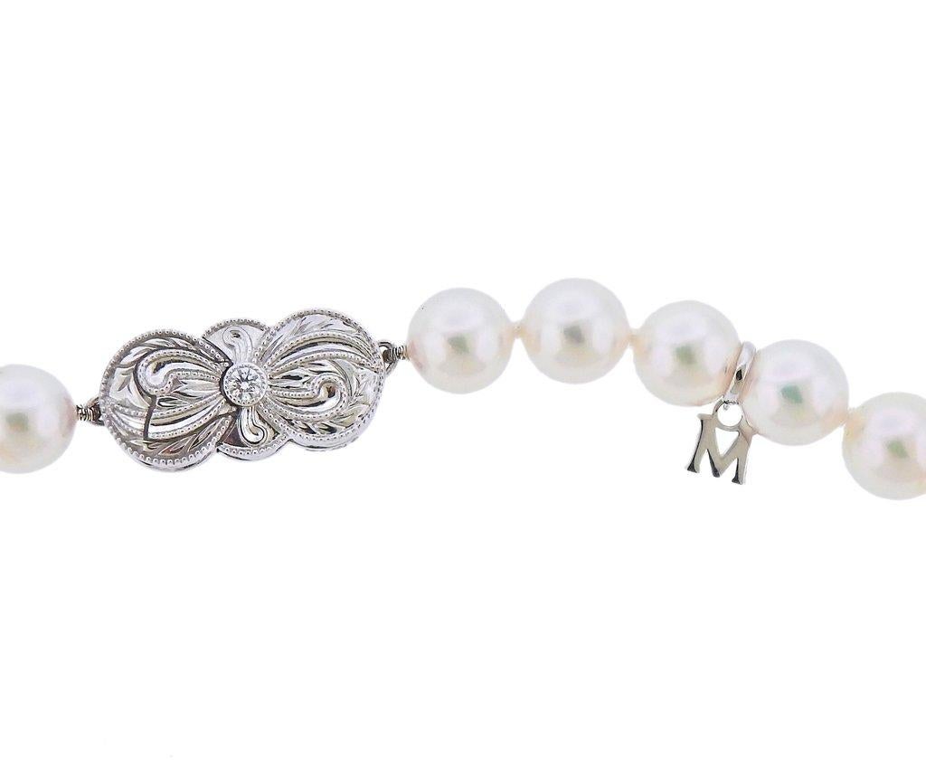 New 18k white gold Ginza special edition necklace and earrings set by Mikimoto, with 8mm to 8.5mm A grade pearls, and approx. 0.10ct diamond on the clasp.Retail $10921, come in box with booklet. Earrings are 8.3mm in diameter, Necklace is 18.25